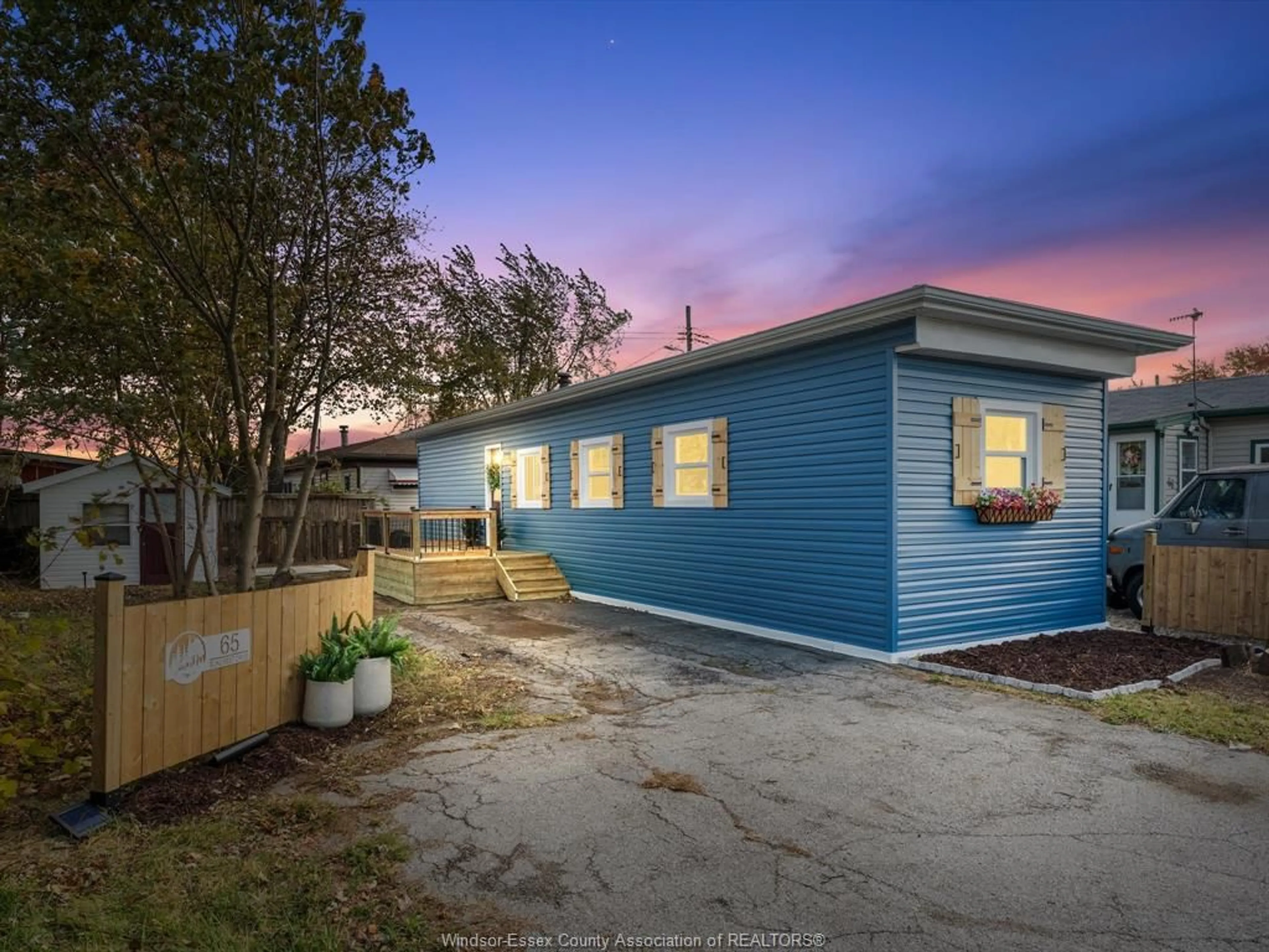 Home with vinyl exterior material, street for 65 SUNCREST Dr, Maidstone Ontario N8N 2P4