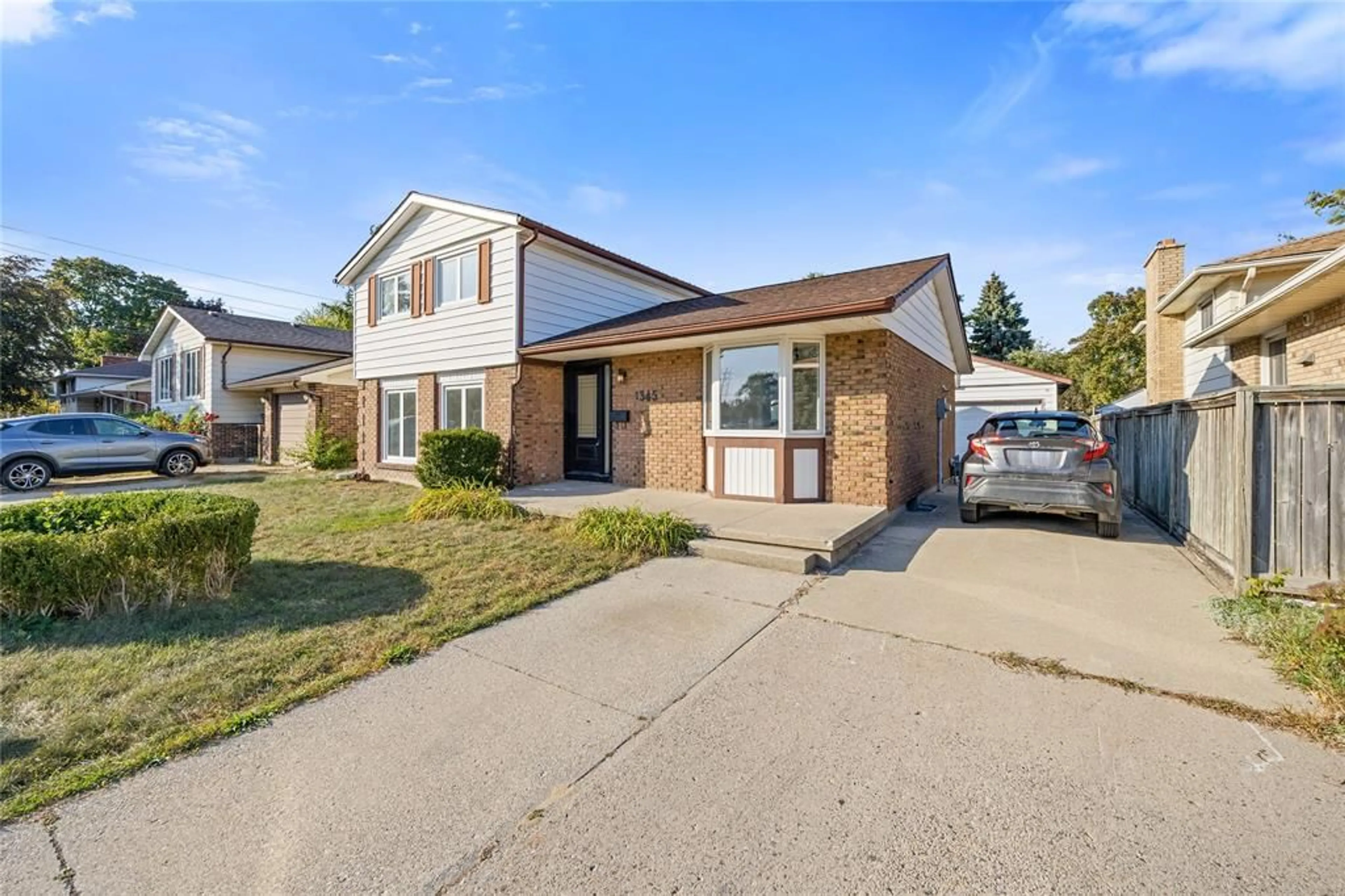 Home with brick exterior material, street for 1345 Wiltshire Dr, Sarnia Ontario N7S 4P3