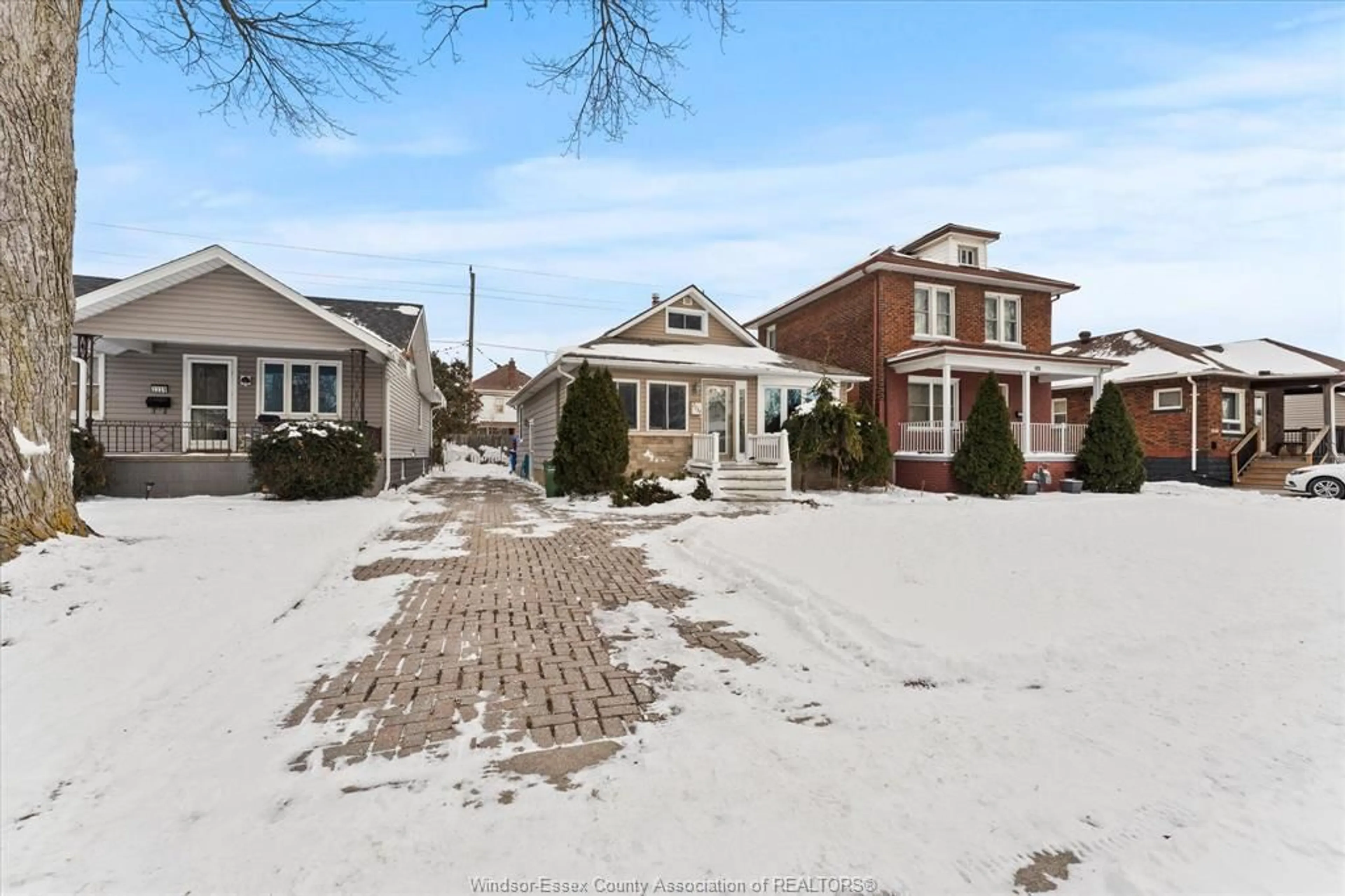 A pic from outside/outdoor area/front of a property/back of a property/a pic from drone, street for 2234 Highland, Windsor Ontario N8X 3S4