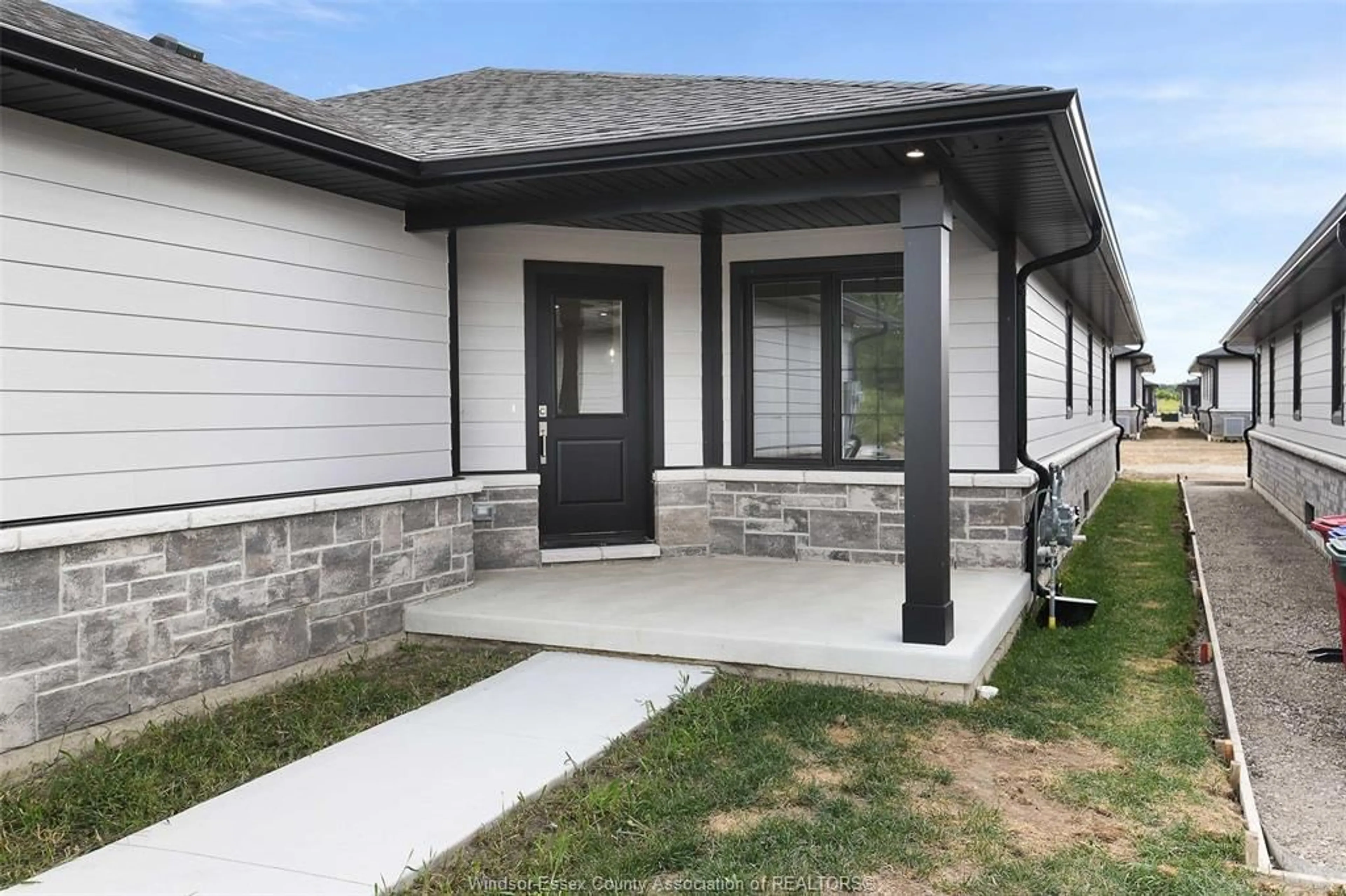 Home with vinyl exterior material, street for 81 MCKENZIE St, Harrow Ontario N0R 1G0