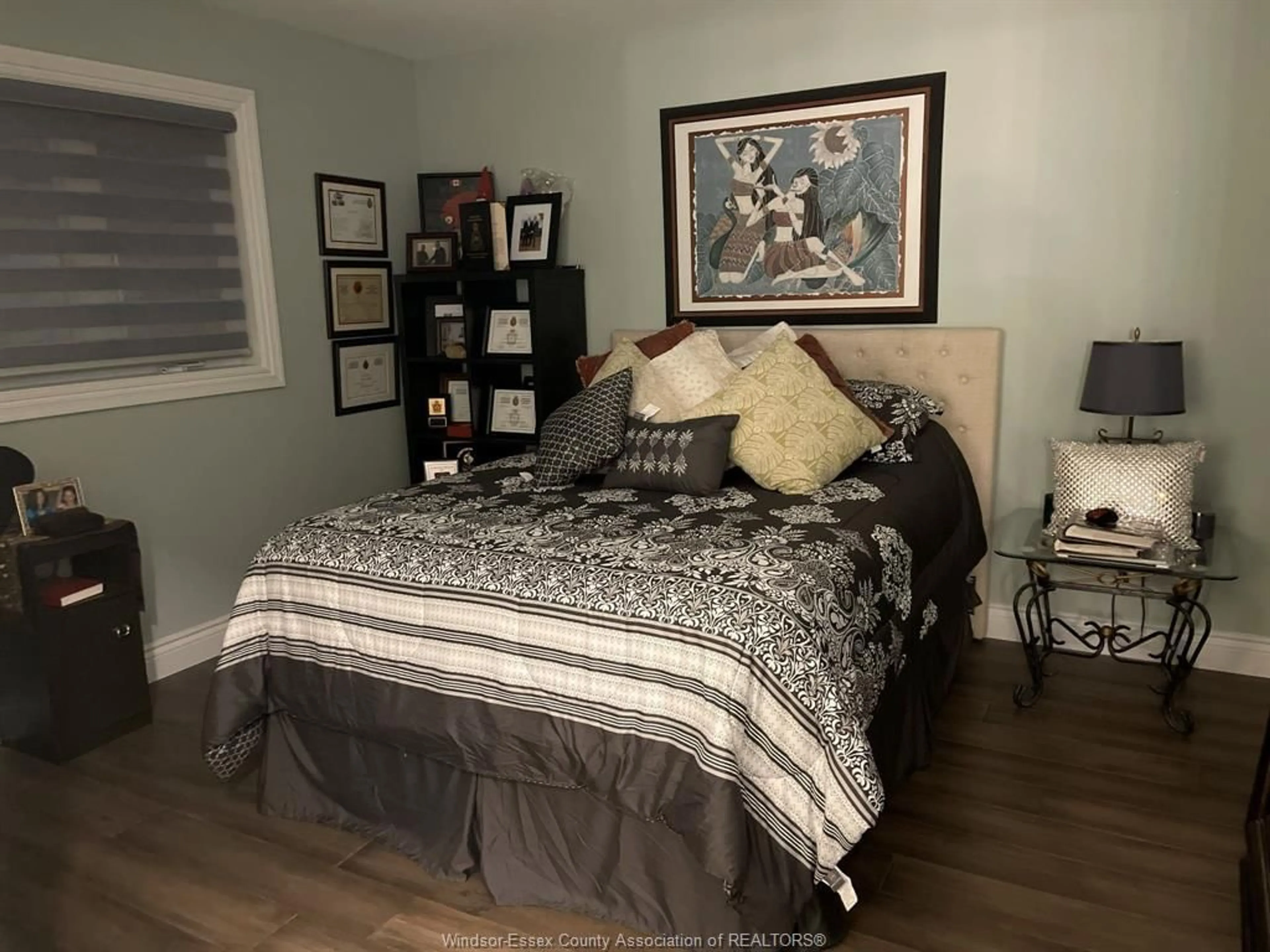 Bedroom with bed, wood/laminate floor for 304 CAROLE Crt, Lakeshore Ontario N0R 1A0