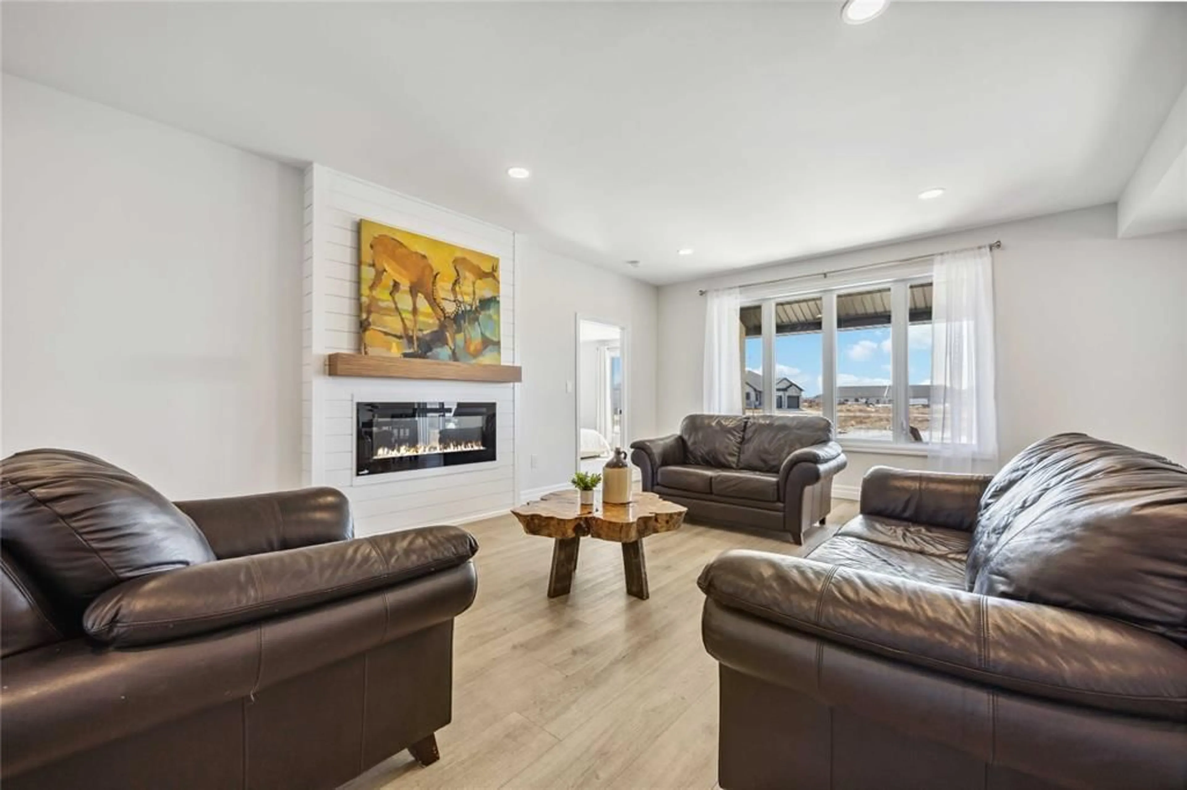 Living room with furniture, unknown for 640 Sweetbay Cres, Sarnia Ontario N7S 0B3