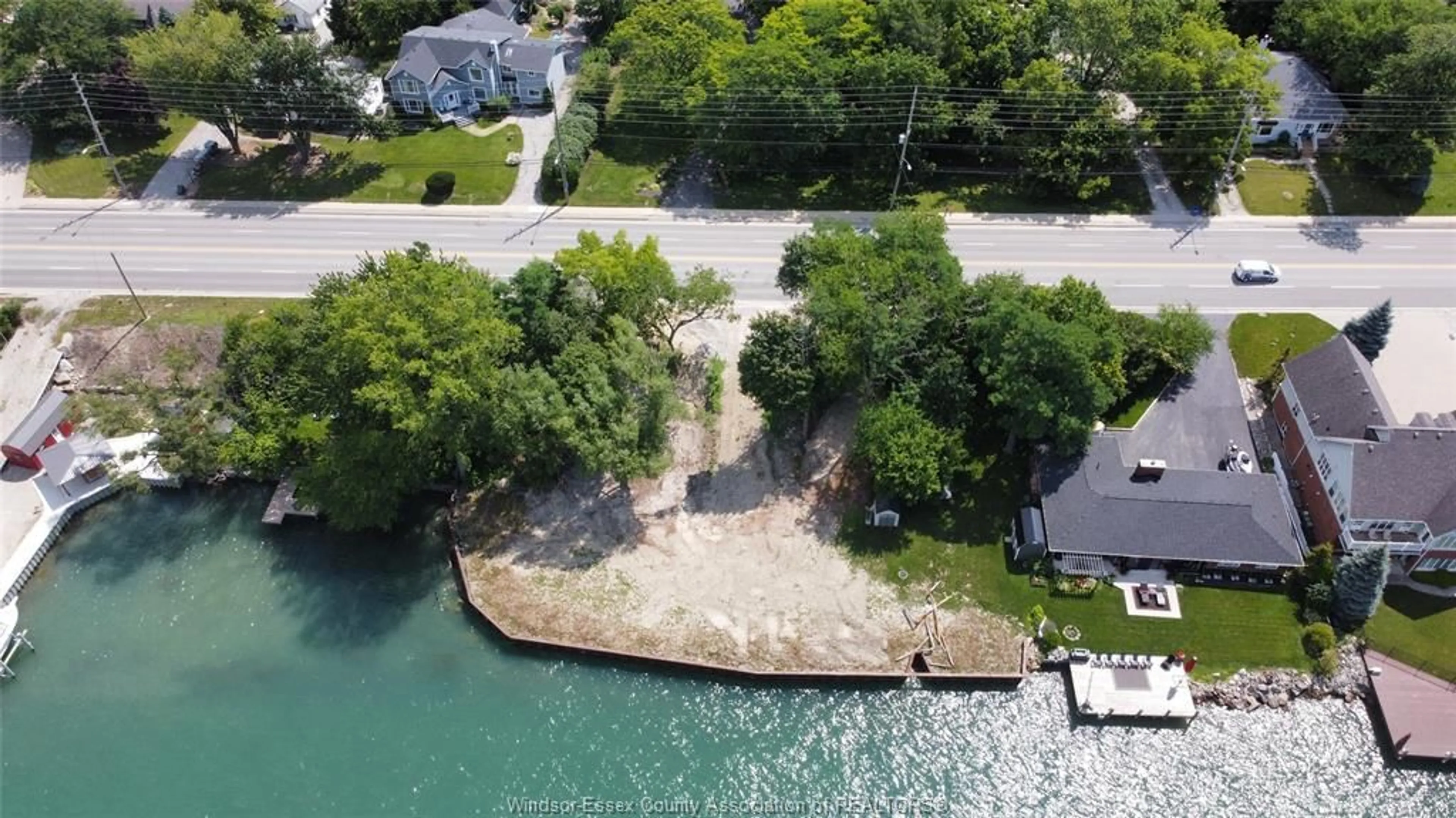 A pic from outside/outdoor area/front of a property/back of a property/a pic from drone, water/lake/river/ocean view for 552 FRONT Rd, Amherstburg Ontario N9V 2V7