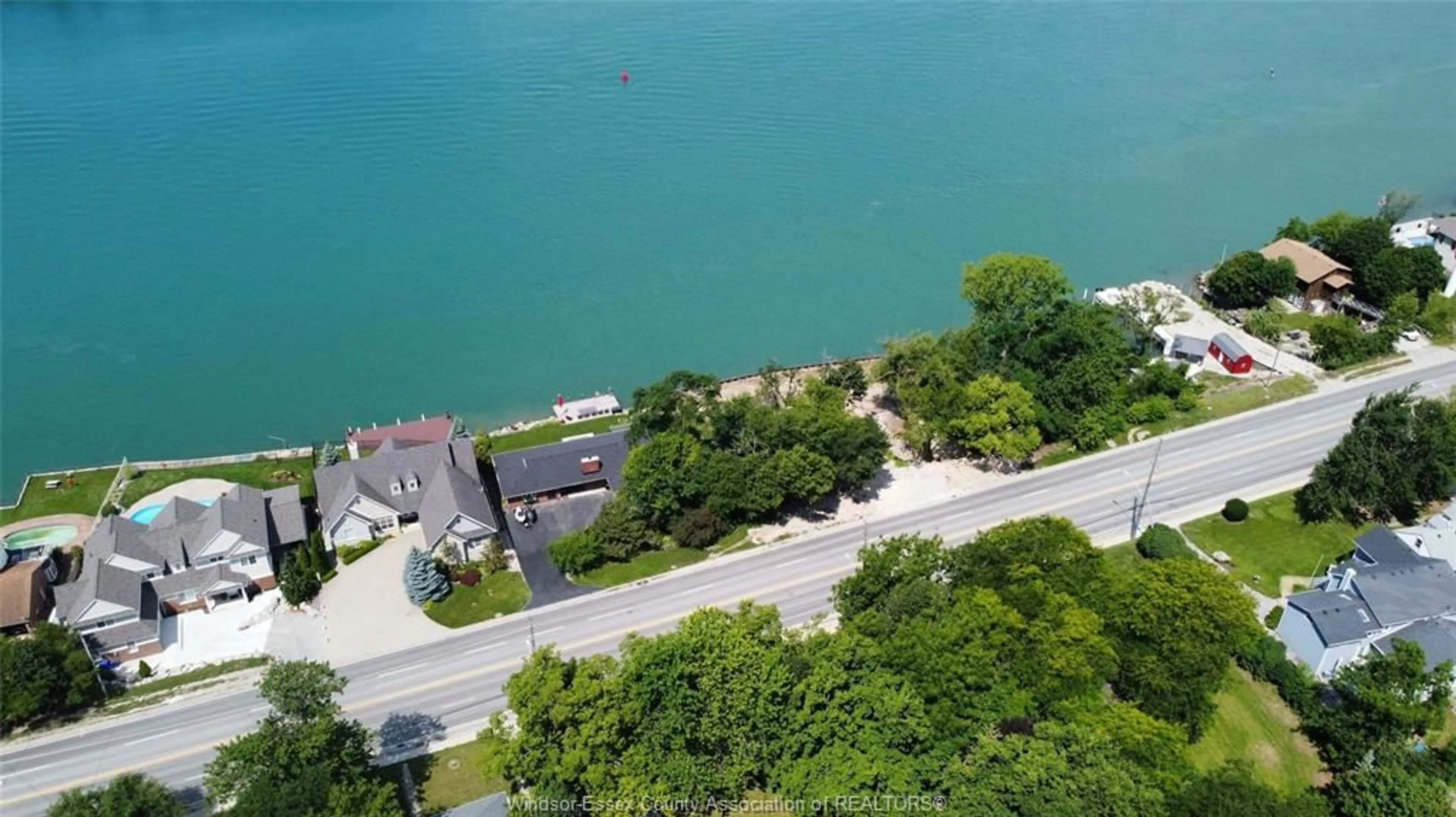 A pic from outside/outdoor area/front of a property/back of a property/a pic from drone, water/lake/river/ocean view for 552 FRONT Rd, Amherstburg Ontario N9V 2V7
