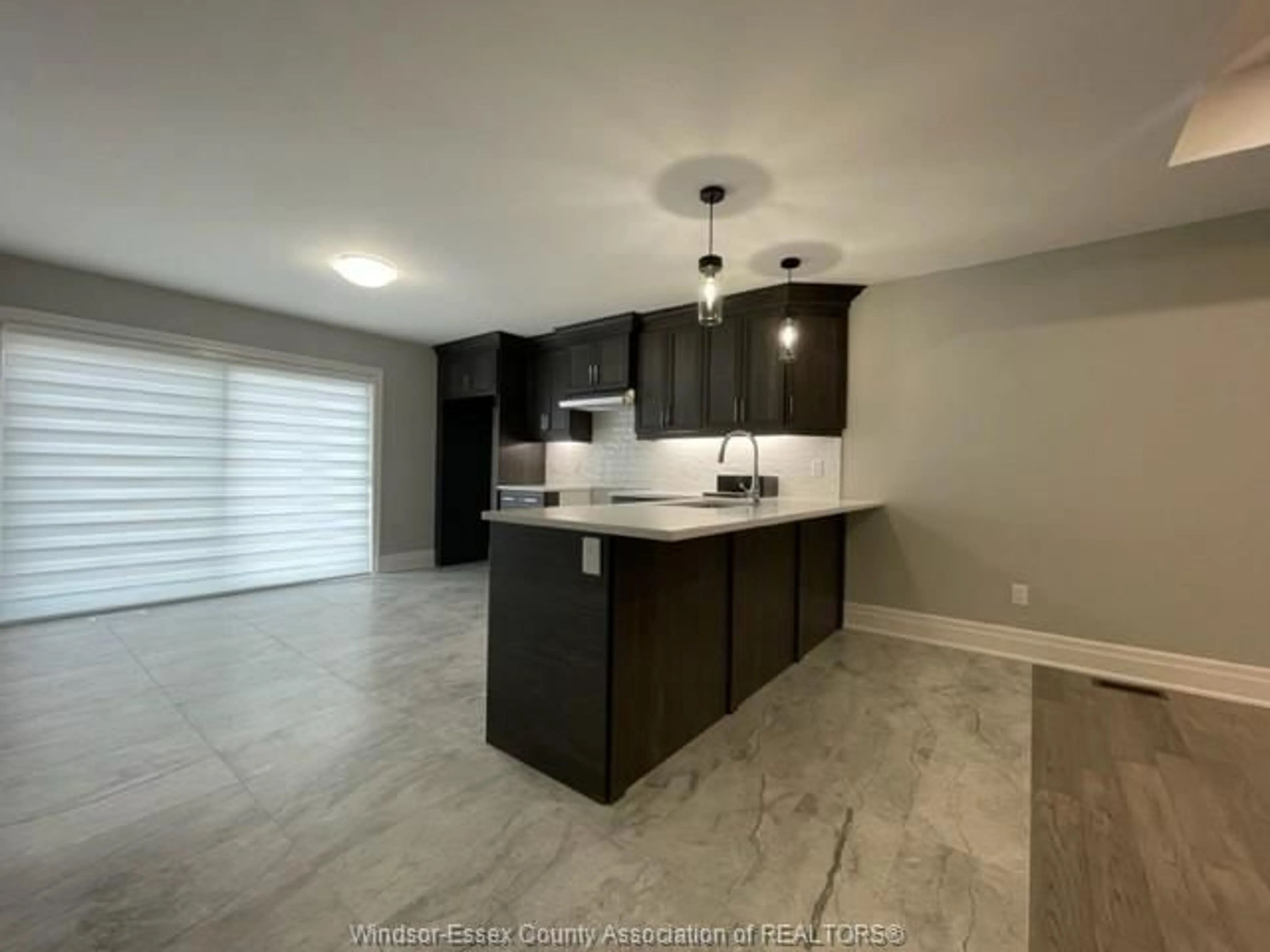 Open concept kitchen, ceramic/tile floor for 115 PETERS St, Essex Ontario N8M 0A9