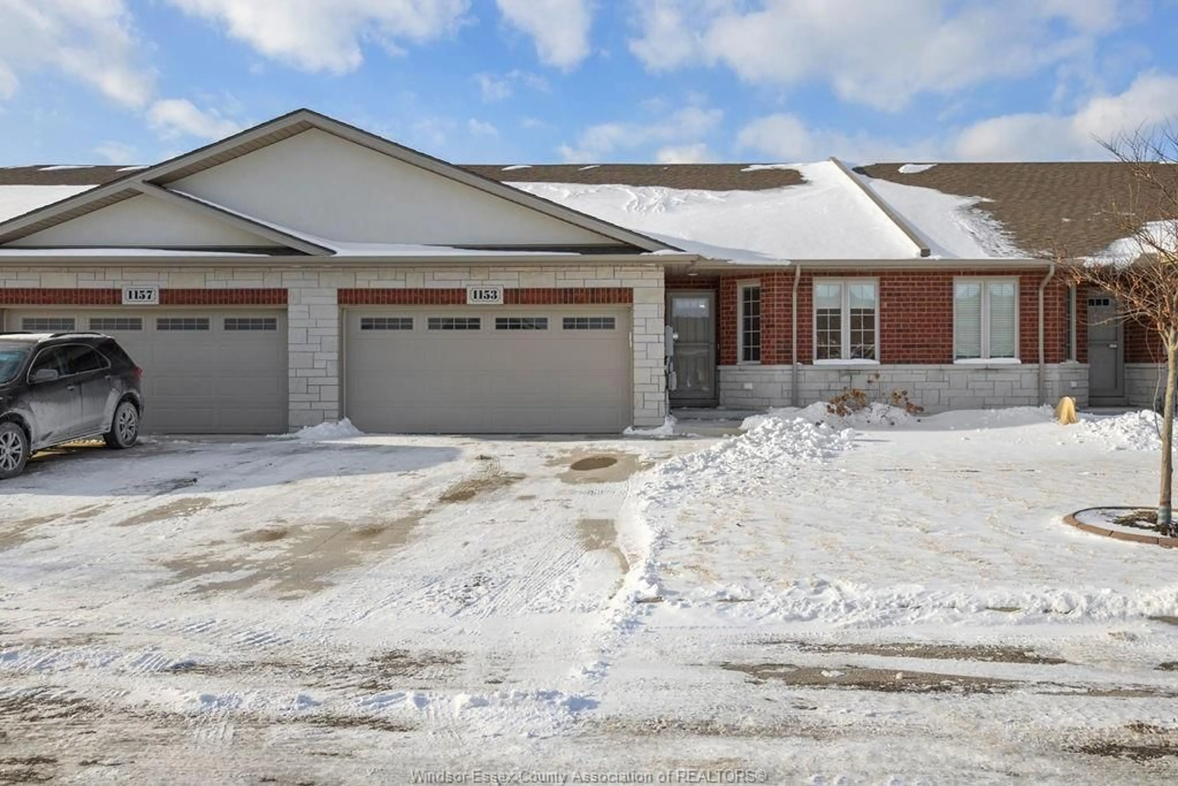 Home with brick exterior material, street for 1153 BRIDALFALLS Cres, Windsor Ontario N8P 0C5