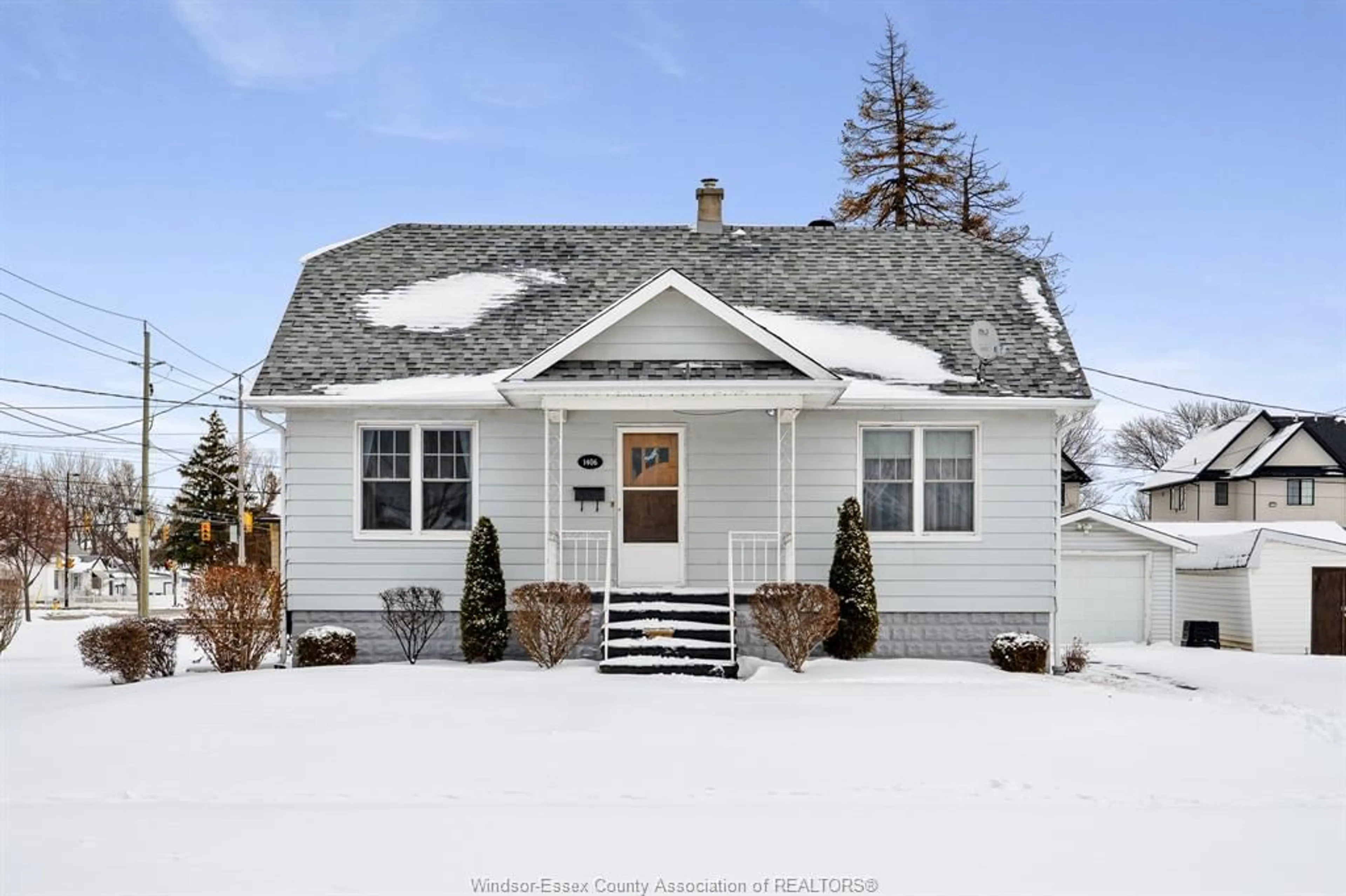 Home with vinyl exterior material, street for 1406 St. Anne St, Tecumseh Ontario N8N 1V2