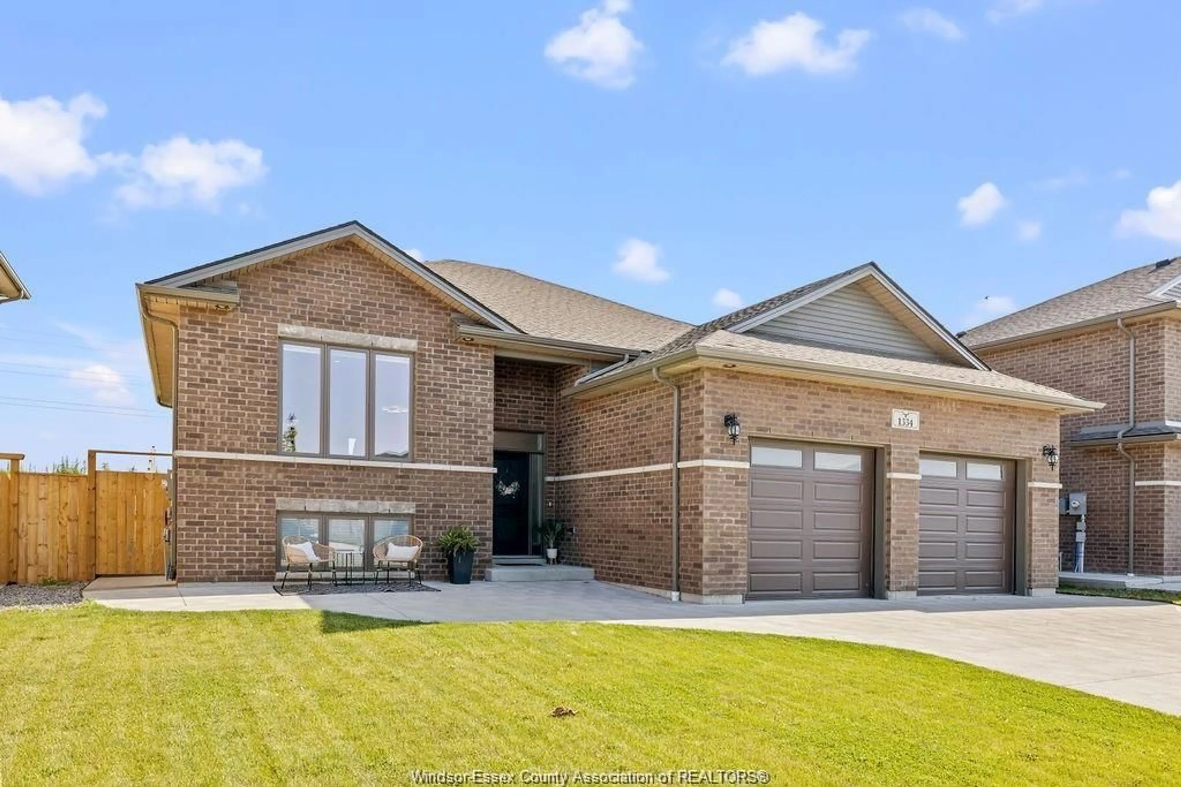 Home with brick exterior material, street for 1334 Deer Run Trail, Lakeshore Ontario N0R 1A0
