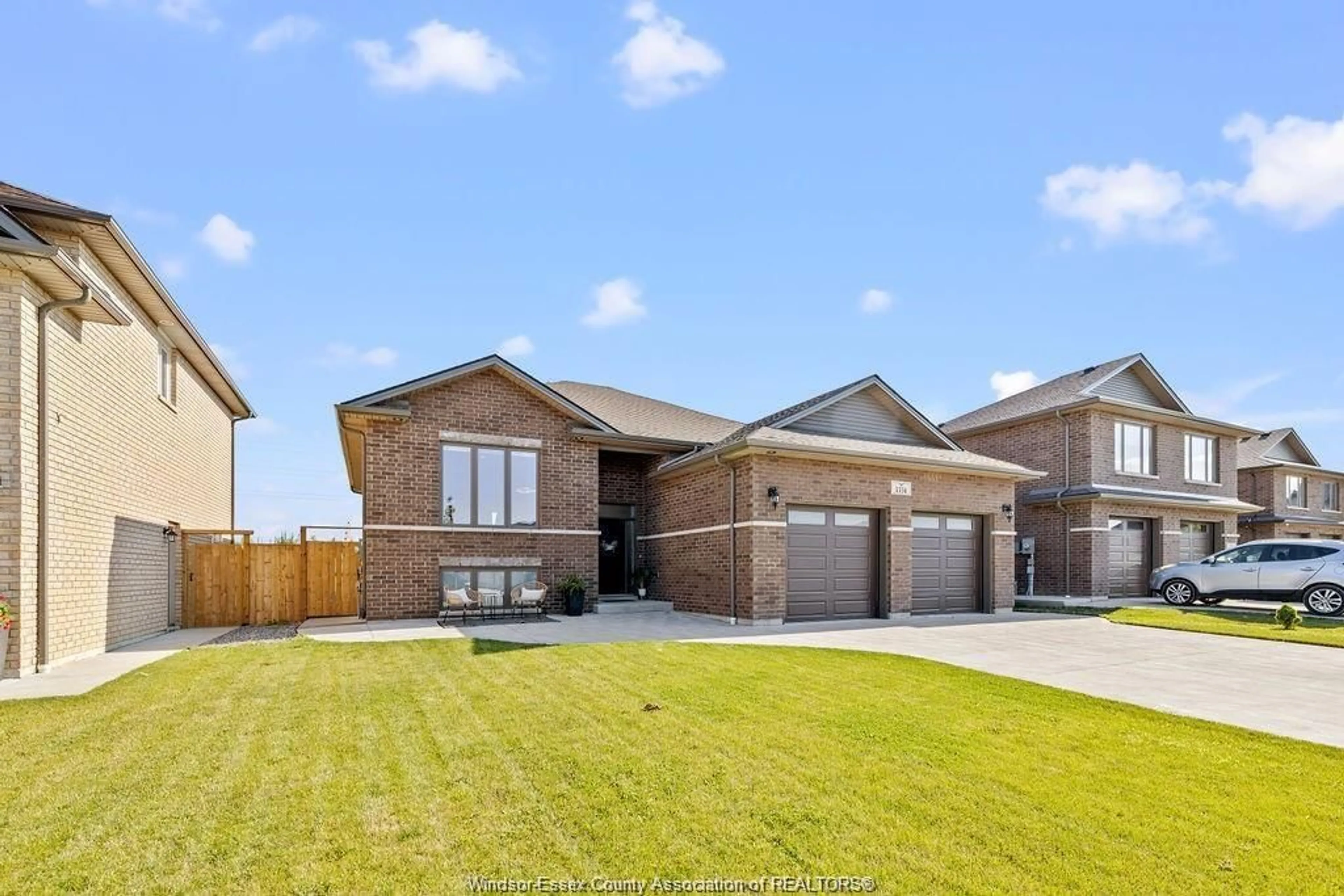 Home with brick exterior material, street for 1334 Deer Run Trail, Lakeshore Ontario N0R 1A0