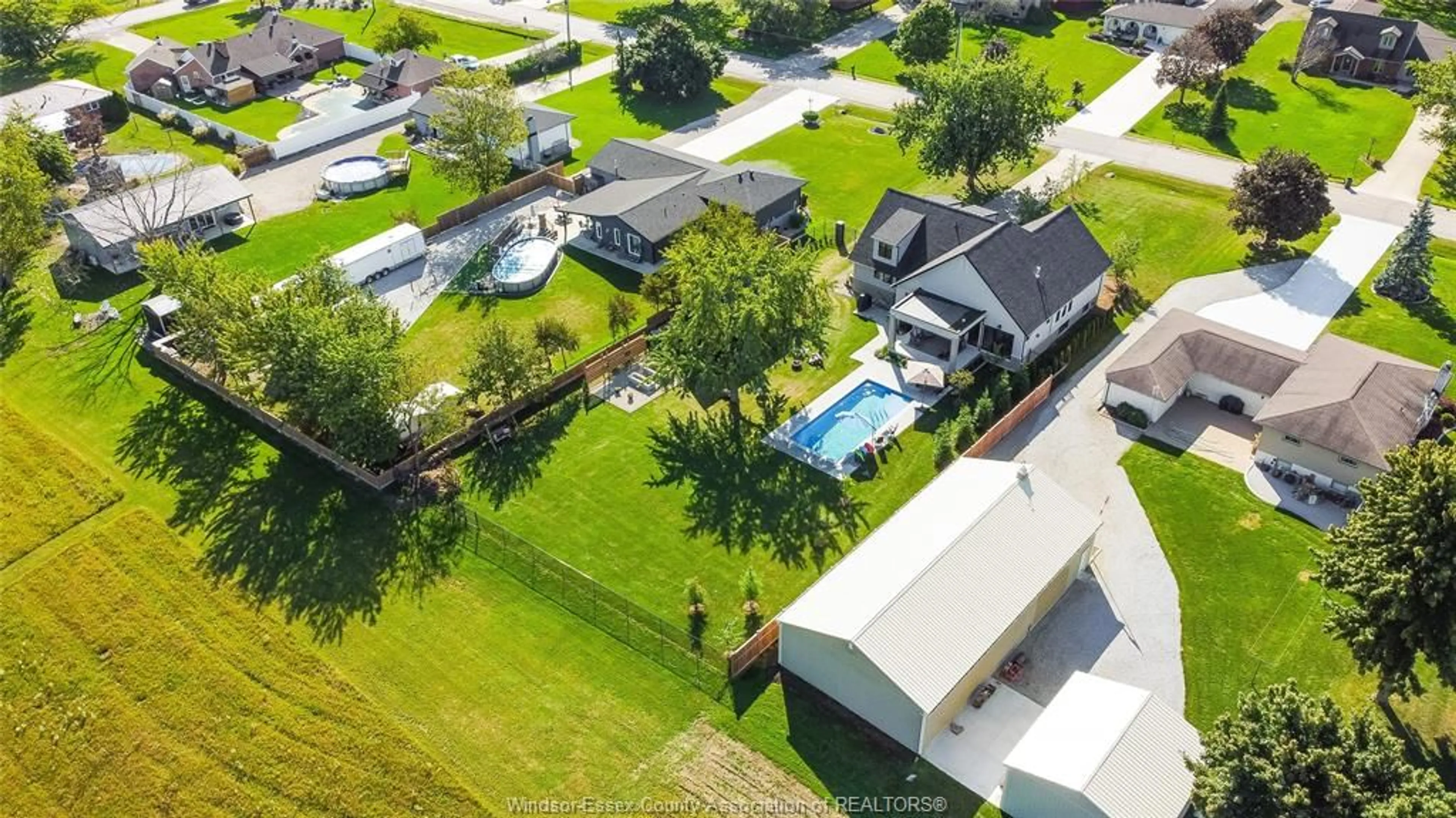 A pic from outside/outdoor area/front of a property/back of a property/a pic from drone, unknown for 77 BISSONNETTE Lane, Lakeshore Ontario N0R 1V0