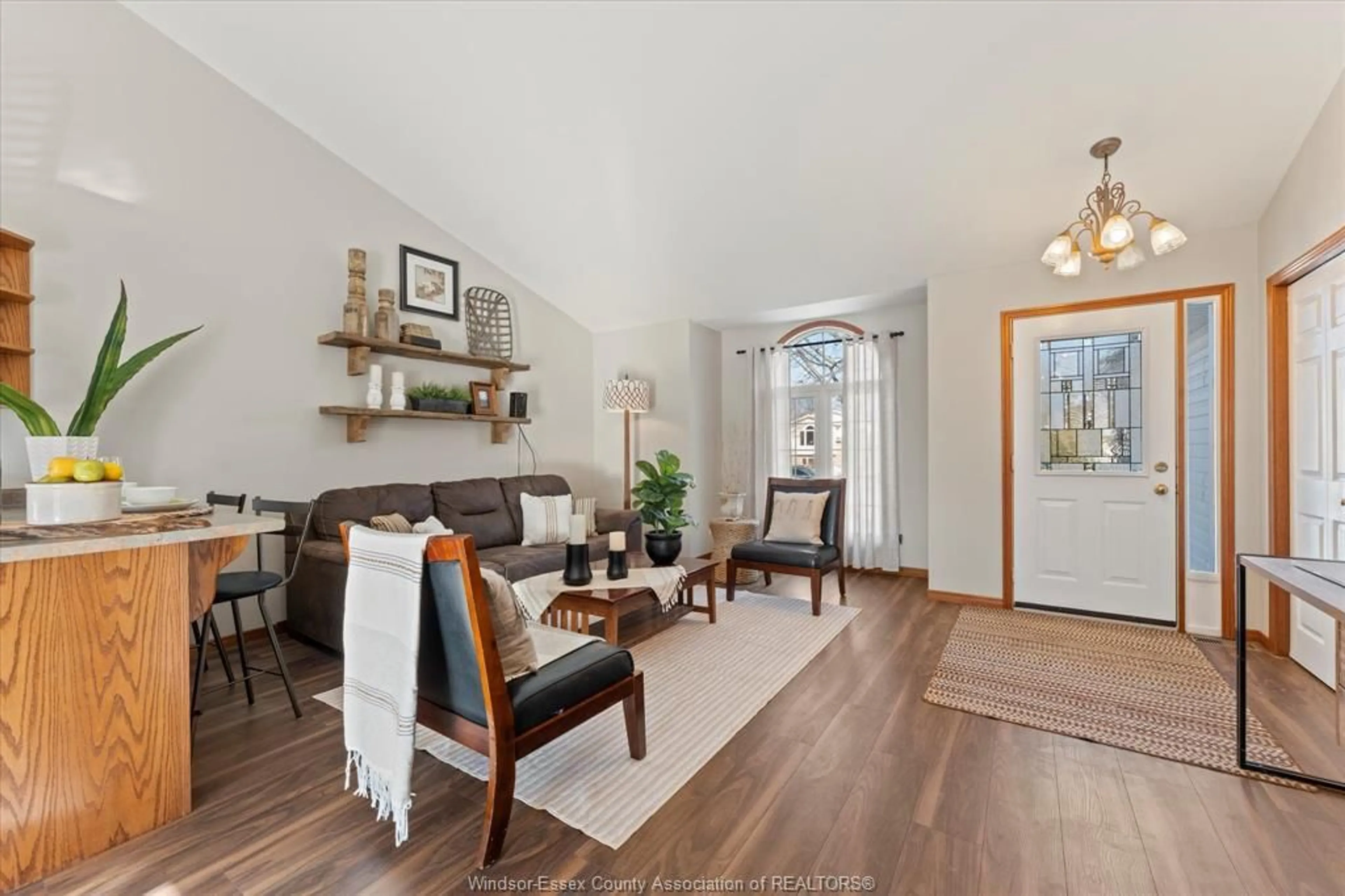 Living room with furniture, wood/laminate floor for 185 MEDITERRANEAN Ave, Amherstburg Ontario N9W 3X9