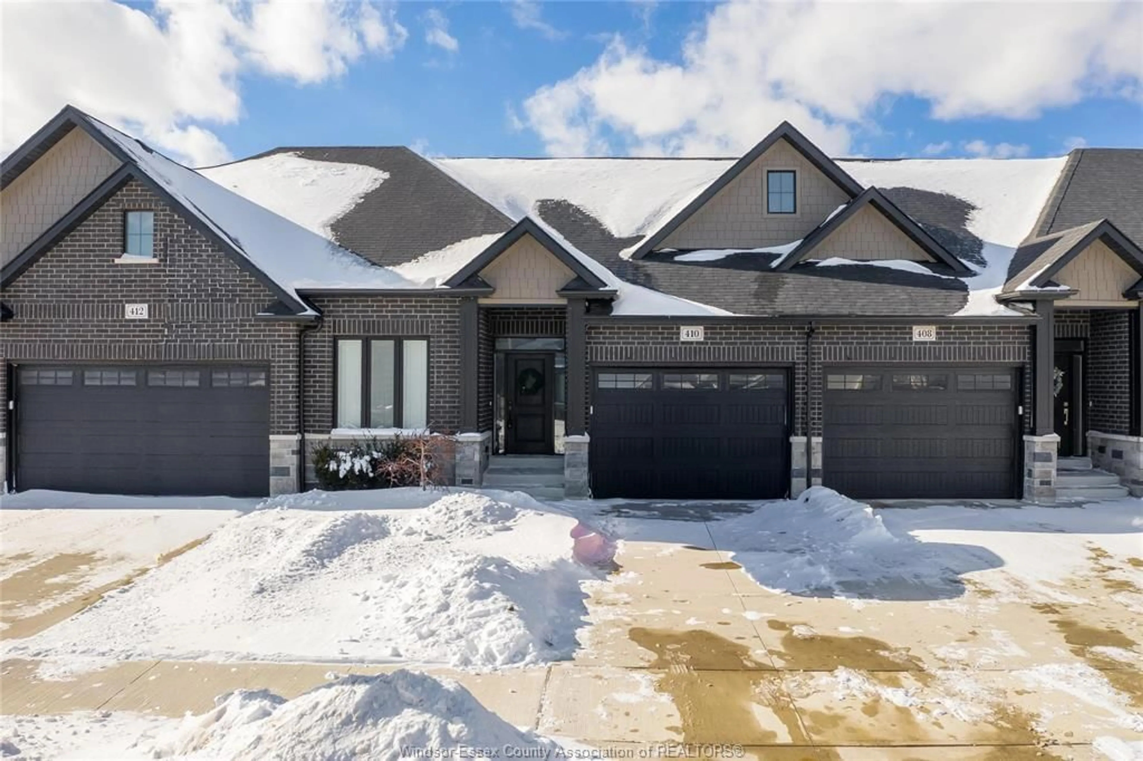 Home with brick exterior material, street for 410 CASERTA Cres, Lakeshore Ontario N0R 1Z0