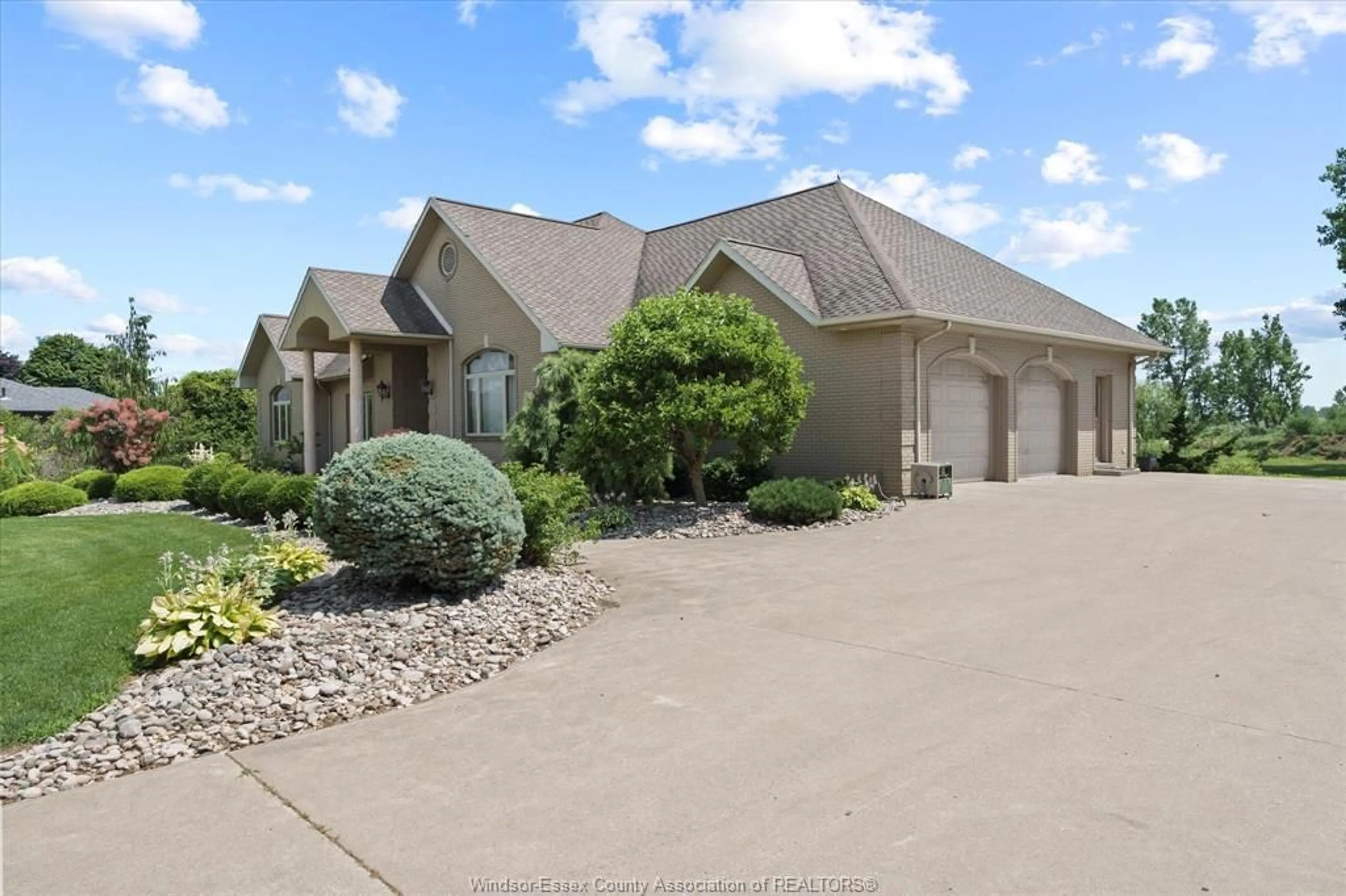 A pic from outside/outdoor area/front of a property/back of a property/a pic from drone, unknown for 210 Mersea 3, Leamington Ontario N8H 3V5