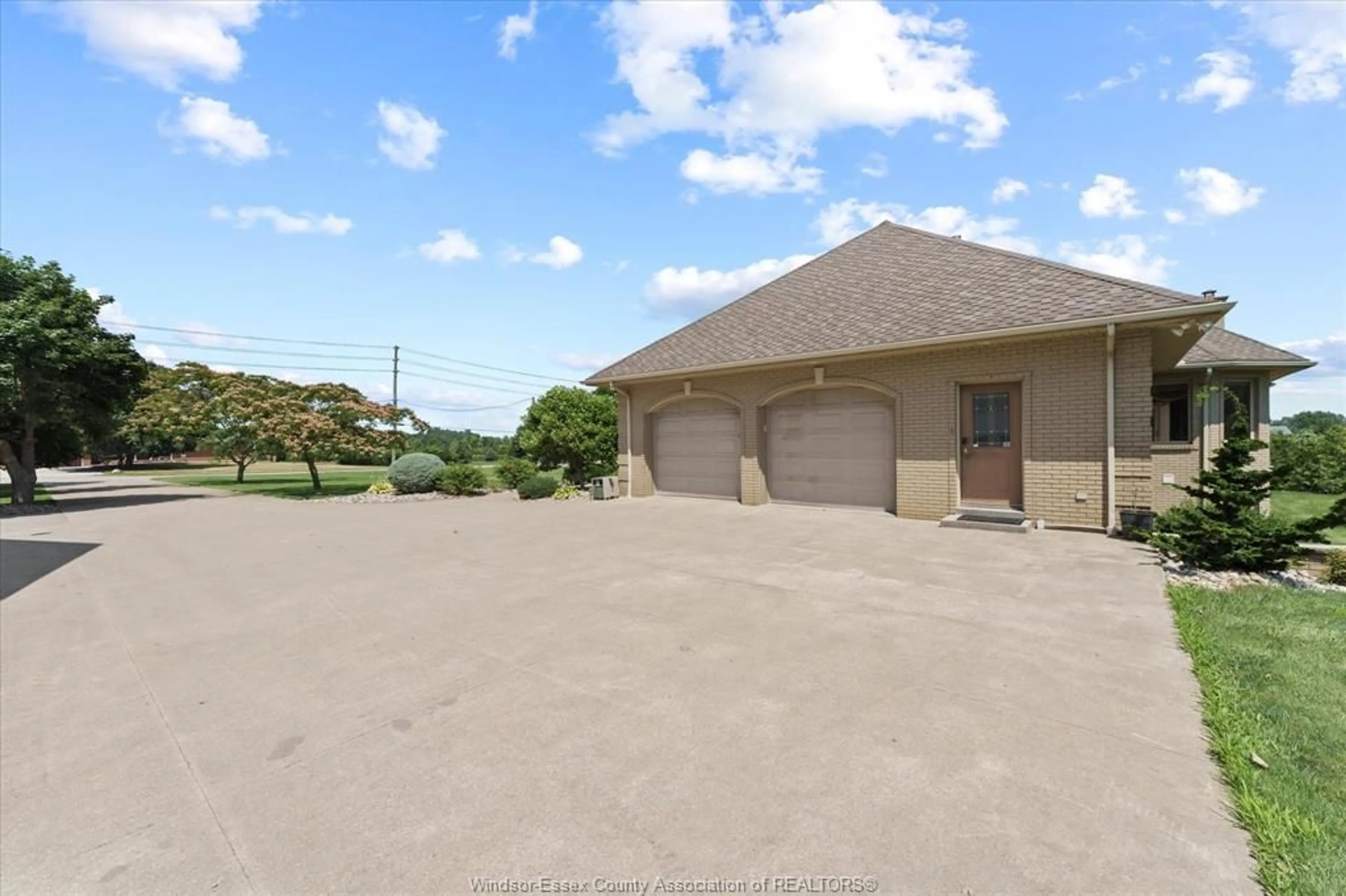 A pic from outside/outdoor area/front of a property/back of a property/a pic from drone, water/lake/river/ocean view for 210 Mersea 3, Leamington Ontario N8H 3V5
