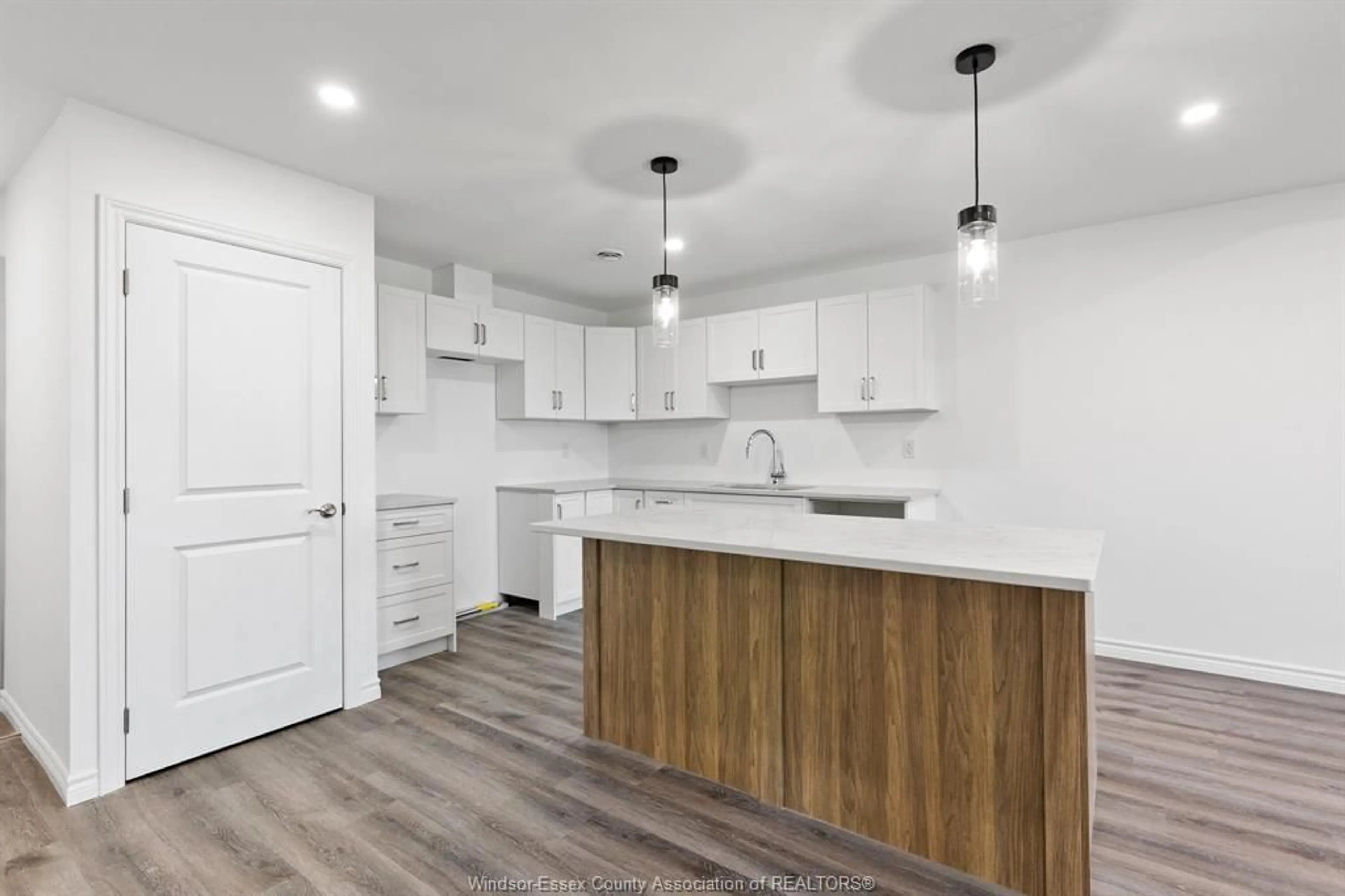 Open concept kitchen, wood/laminate floor for 100 ERIE St, Ridgetown Ontario N0P 2C0