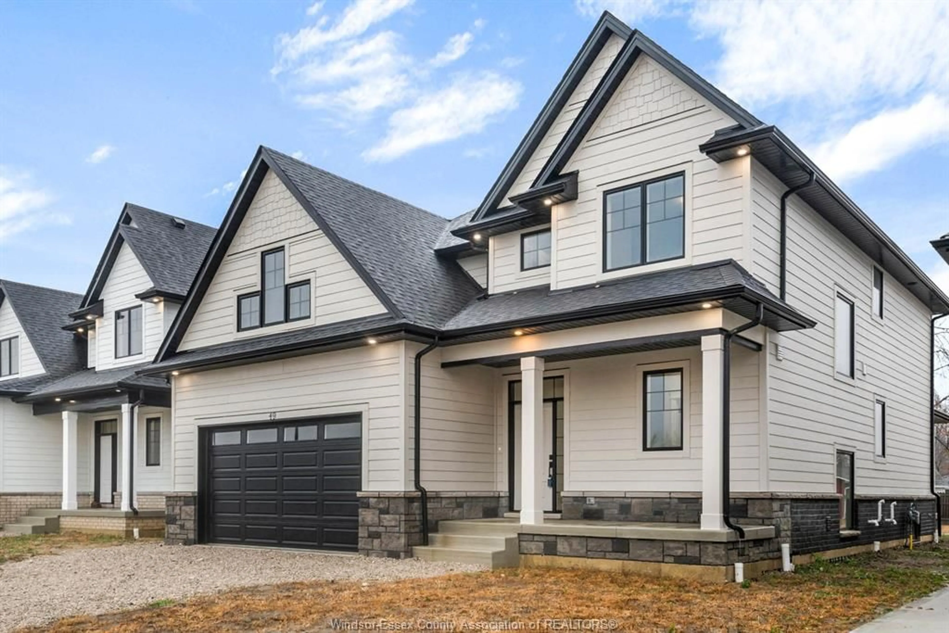 Home with brick exterior material, street for 49 BELLEVIEW Dr, Kingsville Ontario N0R 1B0