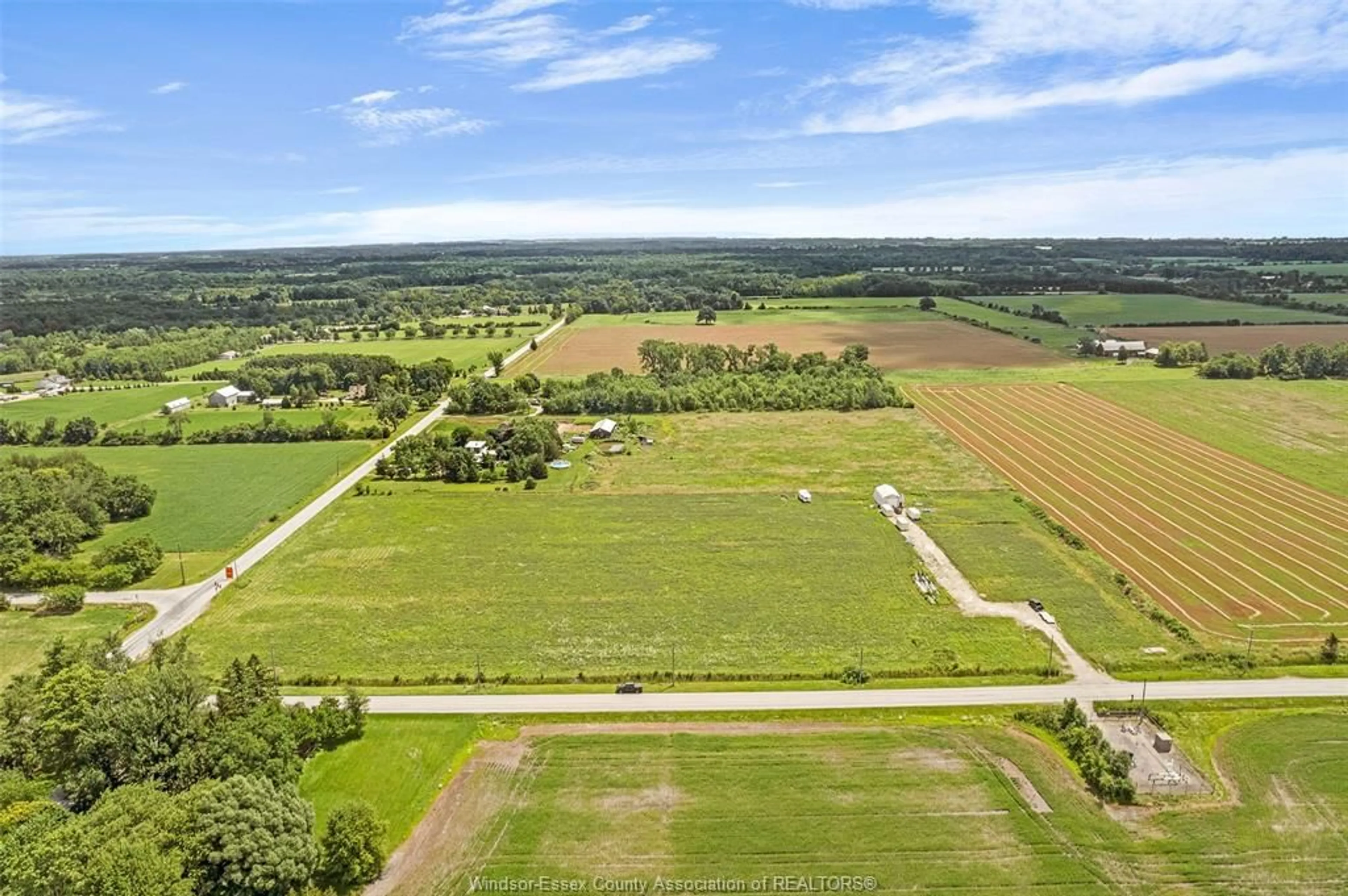 A pic from outside/outdoor area/front of a property/back of a property/a pic from drone, unknown for 2500 MCCORMICK Rd, Harrow Ontario N0R 1G0