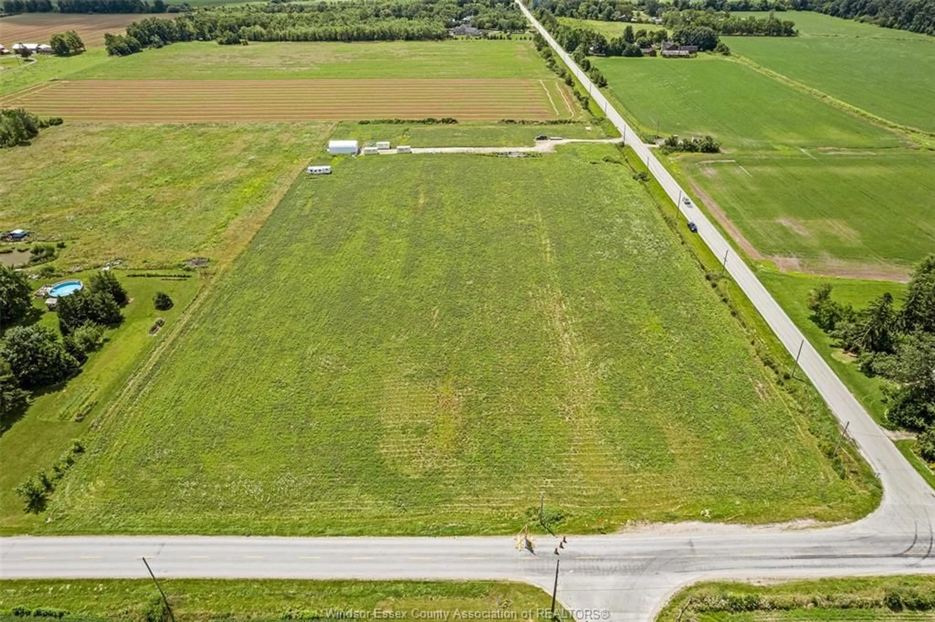 A pic from outside/outdoor area/front of a property/back of a property/a pic from drone, unknown for 2500 MCCORMICK Rd, Harrow Ontario N0R 1G0