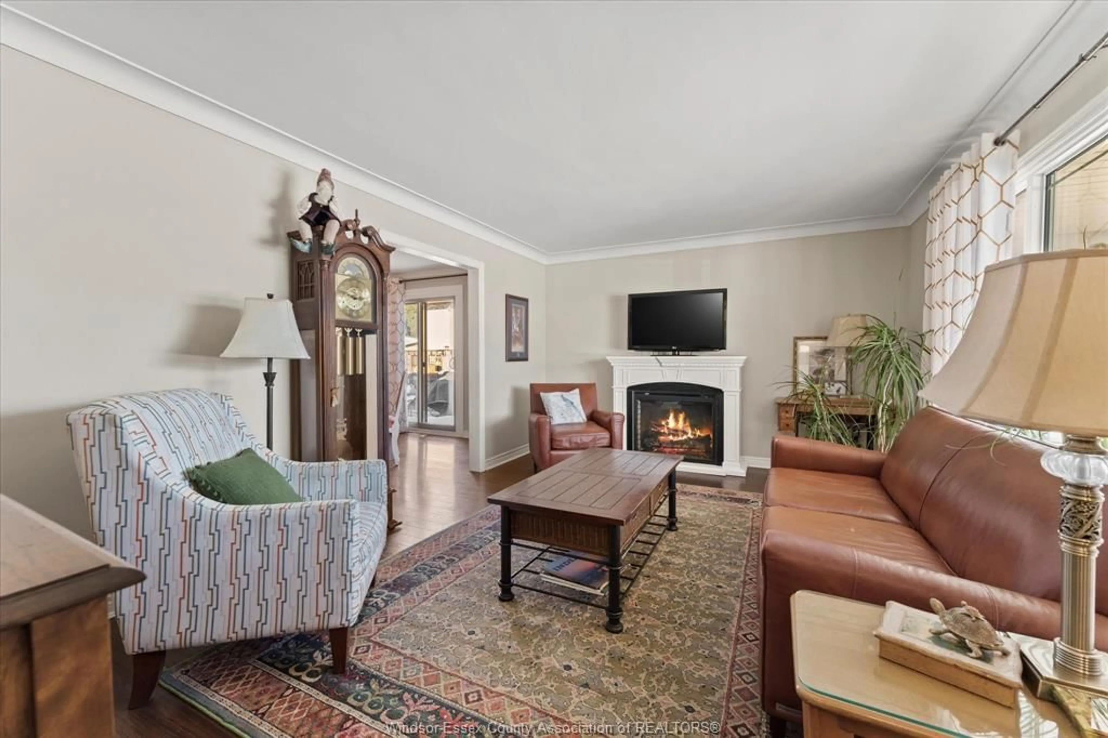 Living room with furniture, unknown for 10659 Keating Cres, Windsor Ontario N8R 1T6