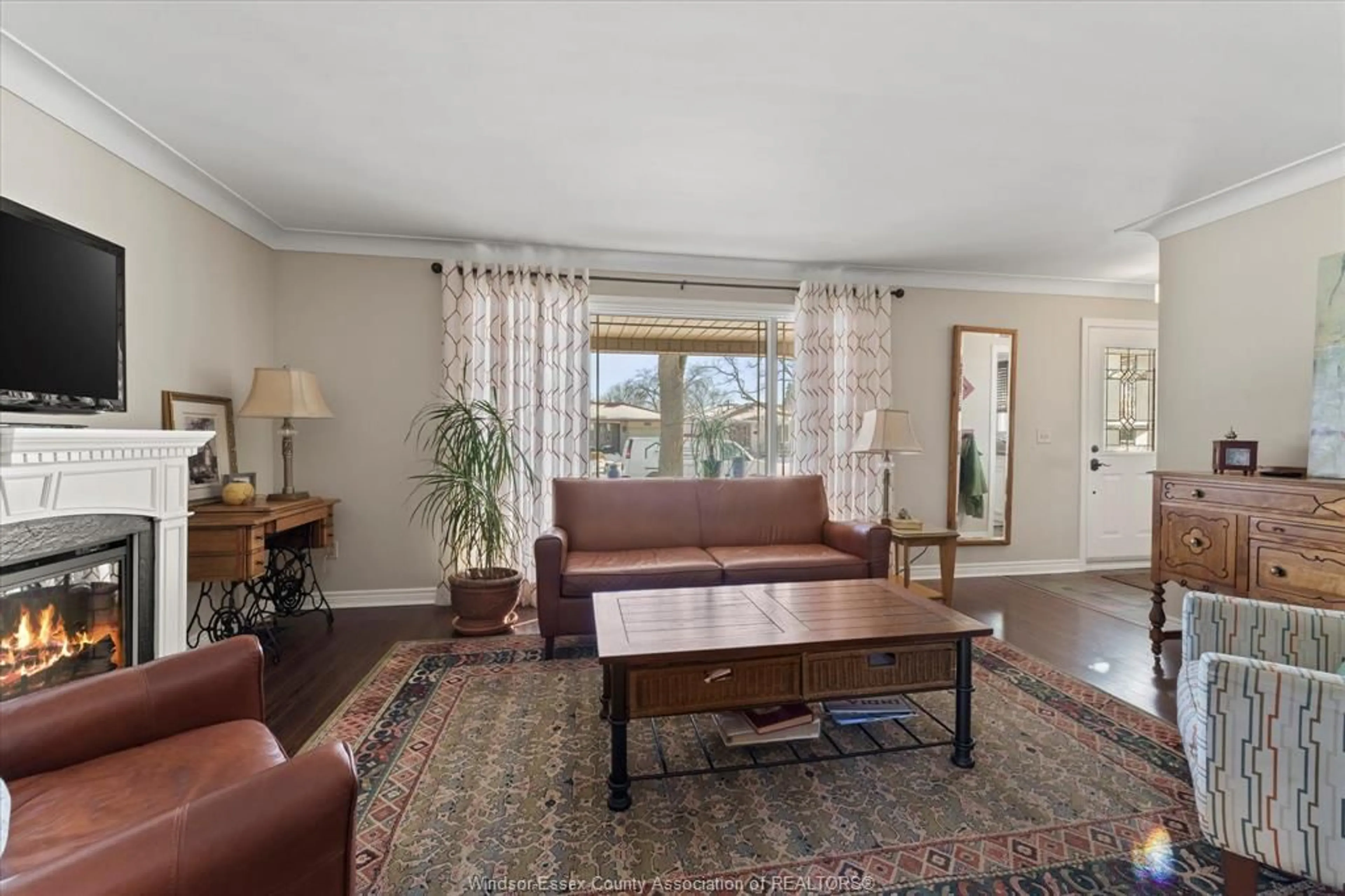 Living room with furniture, unknown for 10659 Keating Cres, Windsor Ontario N8R 1T6