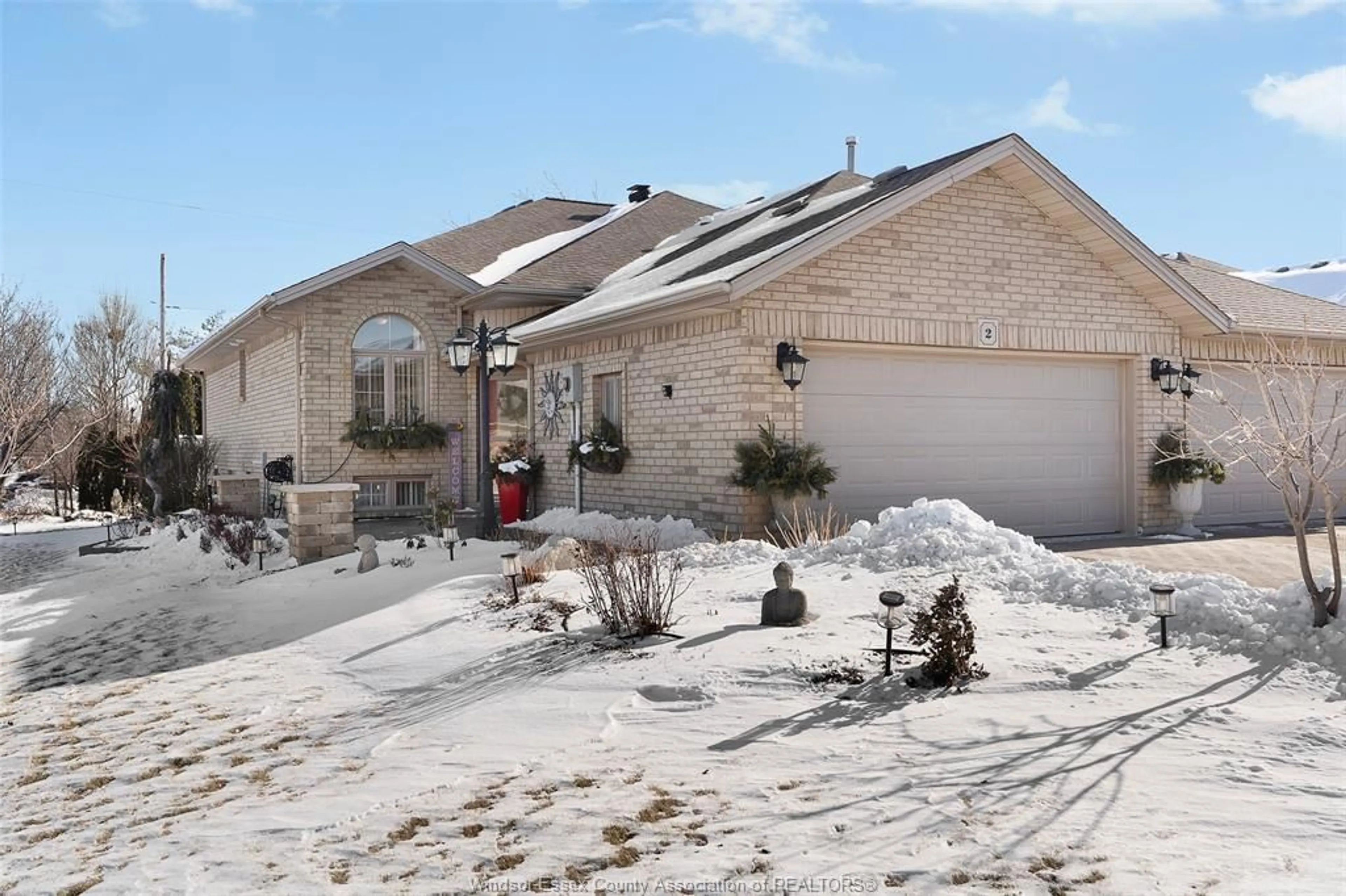 Home with brick exterior material, street for 2 QUEEN'S HILL Cres, Leamington Ontario N8H 5M6