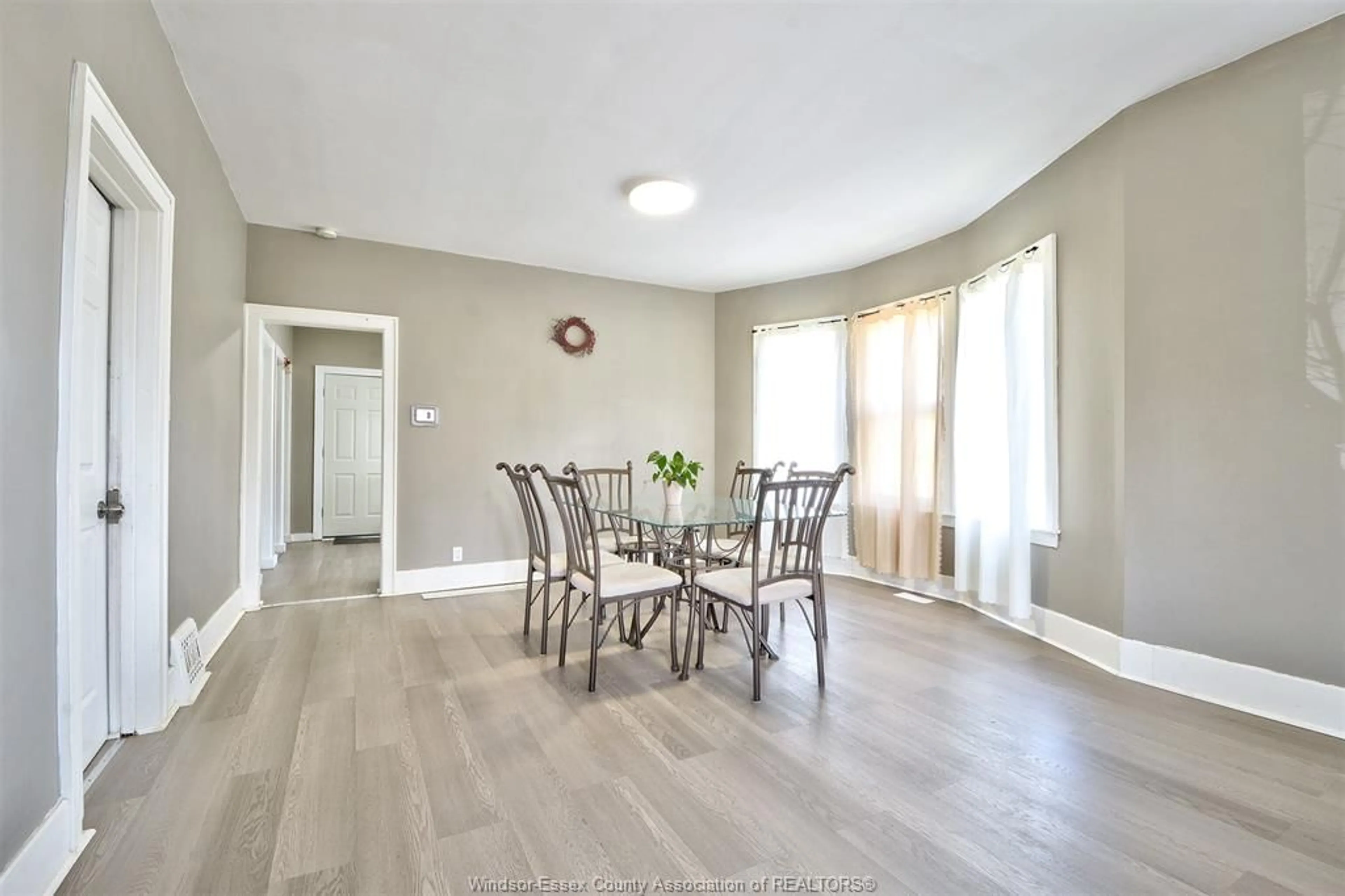 Dining room, wood/laminate floor for 3264 BABY St, Windsor Ontario N9C 1K8