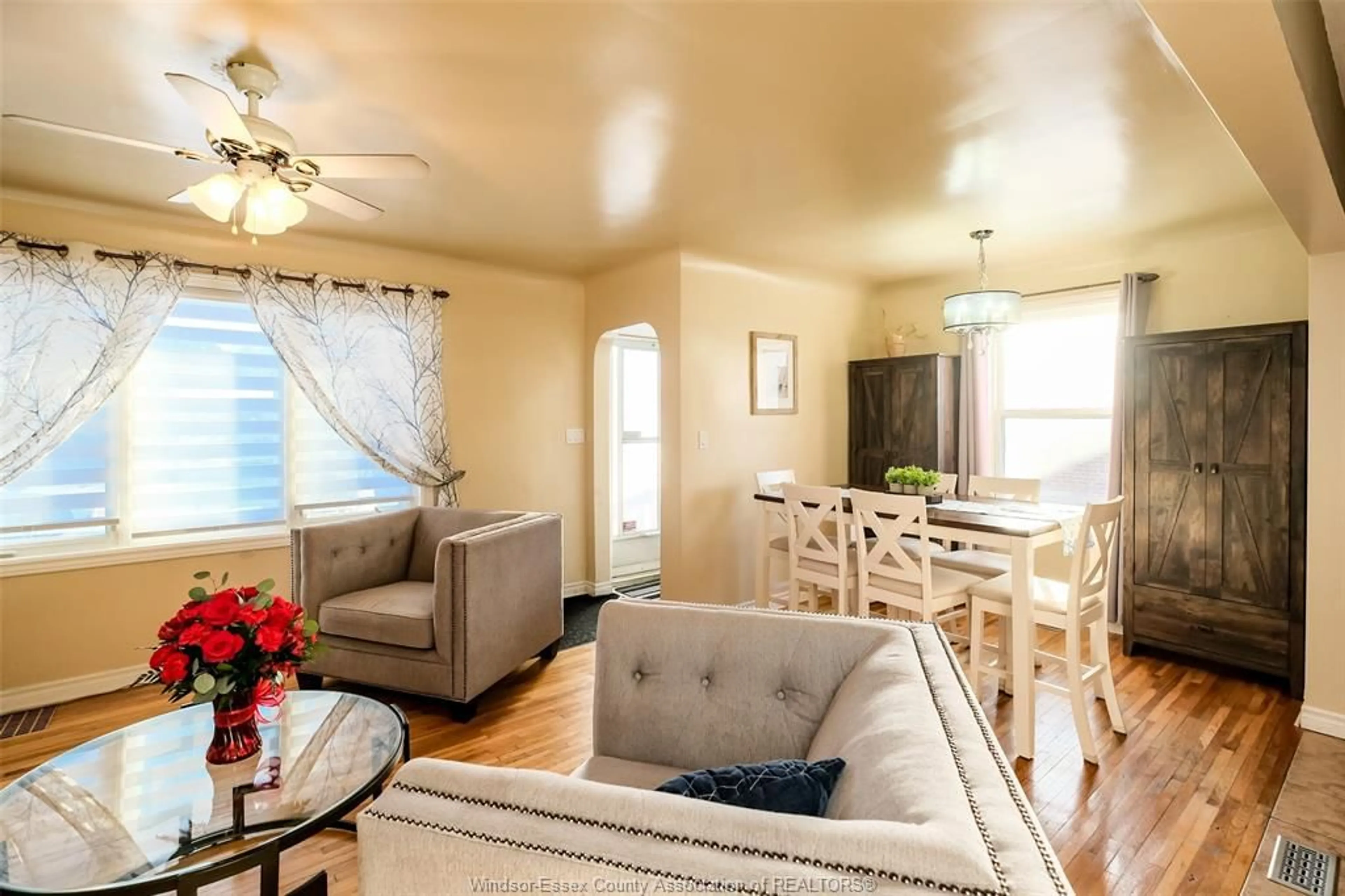 Living room with furniture, wood/laminate floor for 3465 LONGFELLOW, Windsor Ontario N9E 2L8