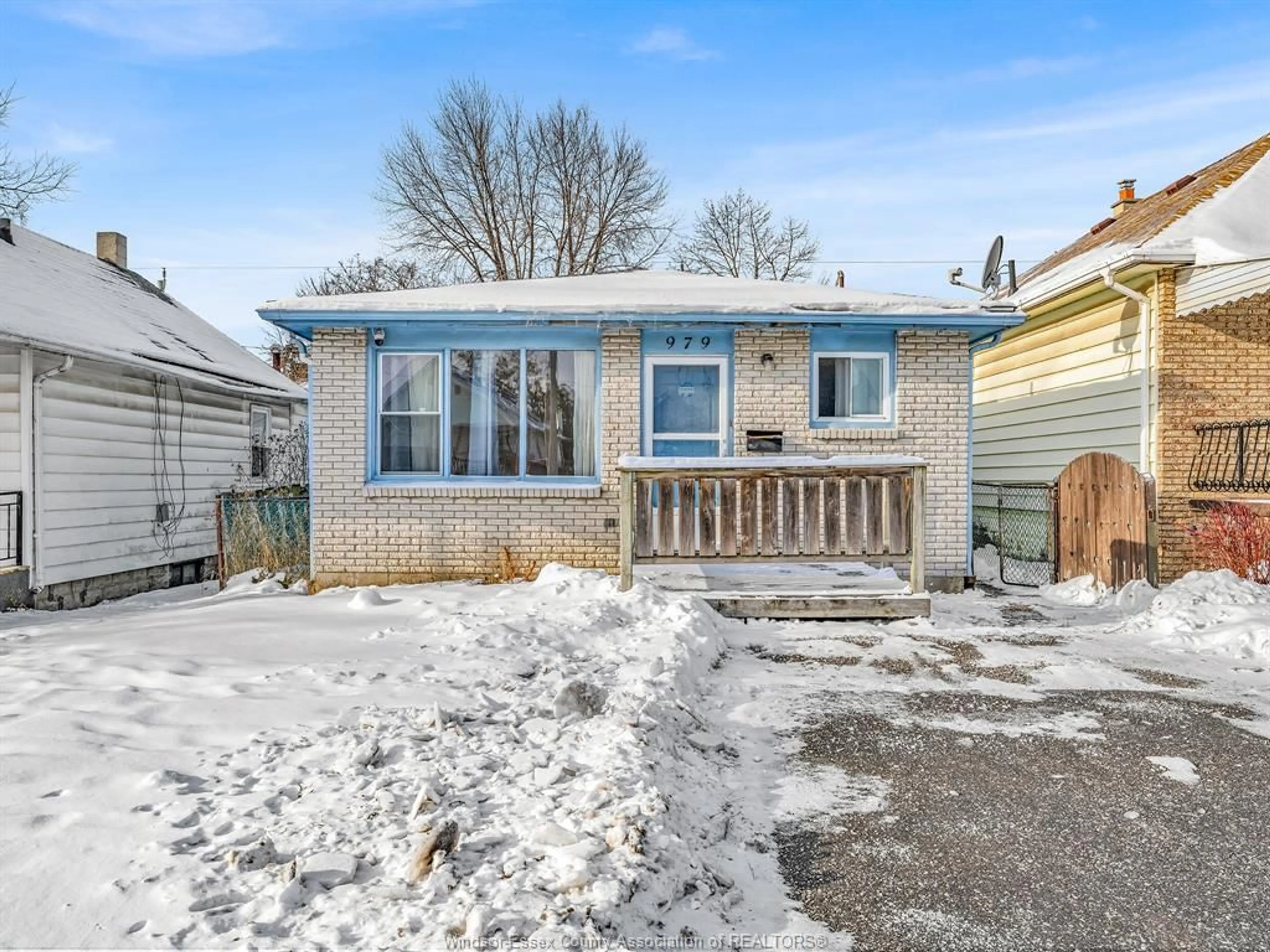 Home with vinyl exterior material, street for 979 MCKAY Ave, Windsor Ontario N9B 2A4