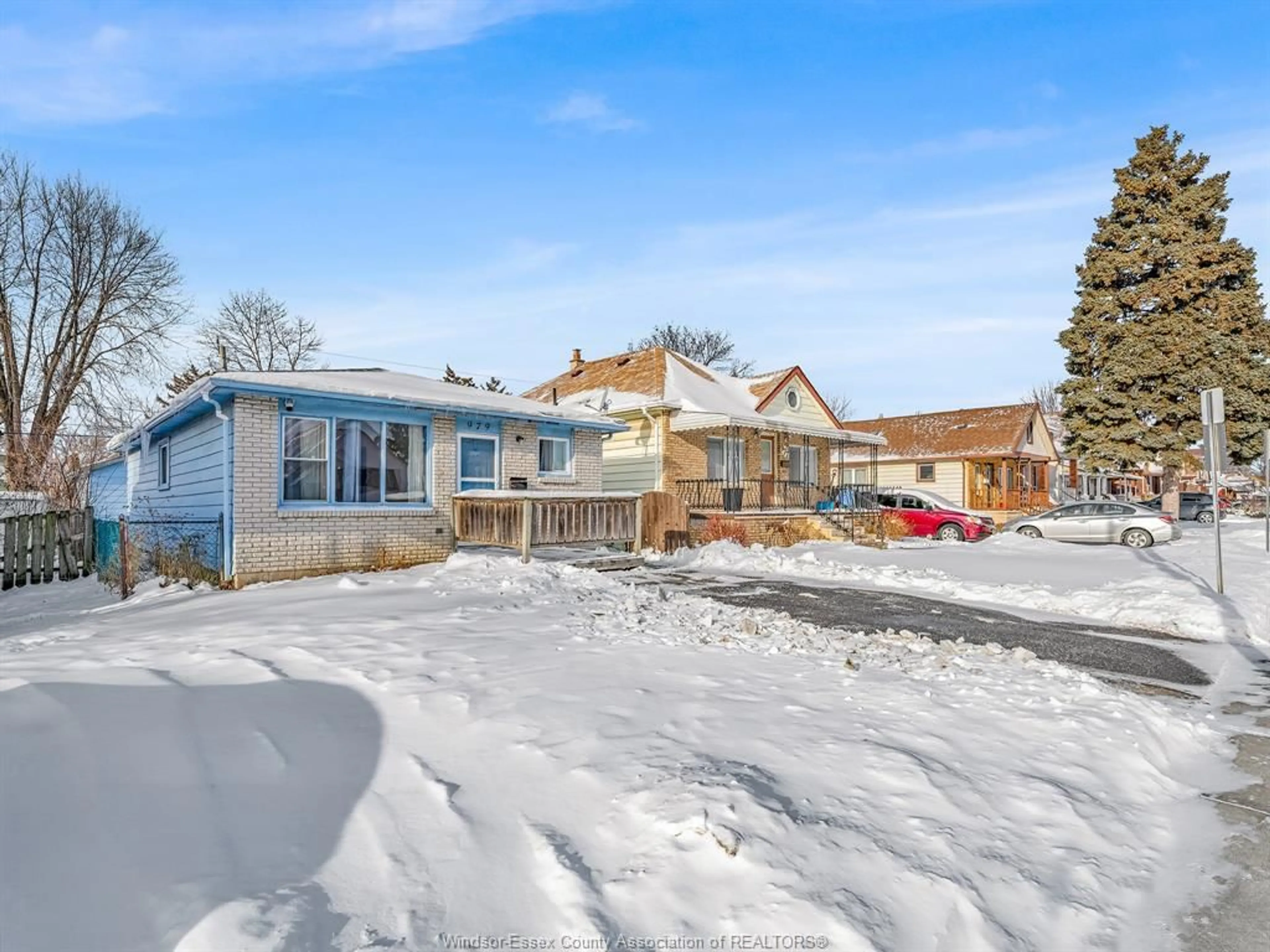 A pic from outside/outdoor area/front of a property/back of a property/a pic from drone, street for 979 MCKAY Ave, Windsor Ontario N9B 2A4