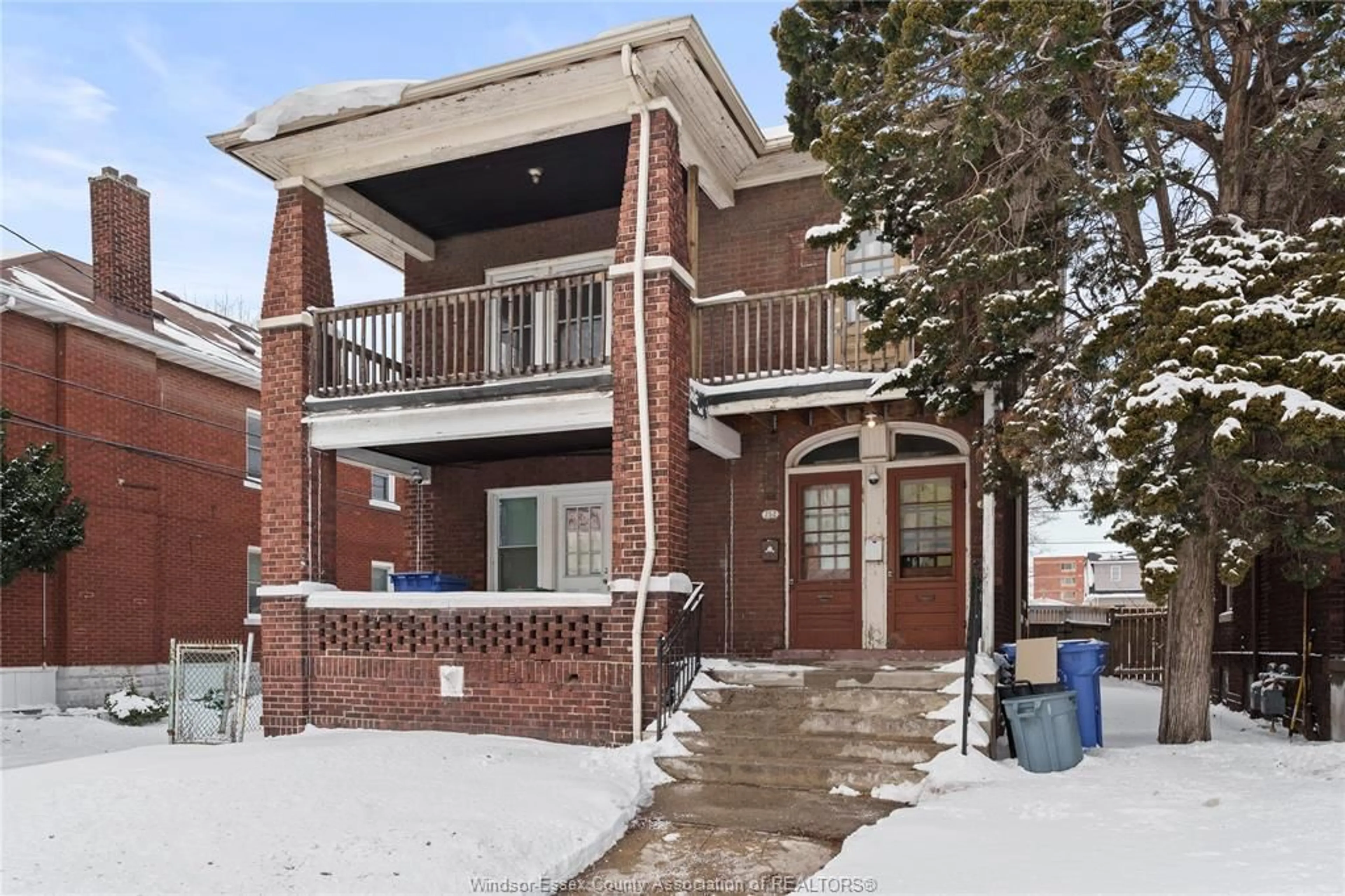 Home with brick exterior material, street for 252-254 GILES Blvd, Windsor Ontario N9A 4C2