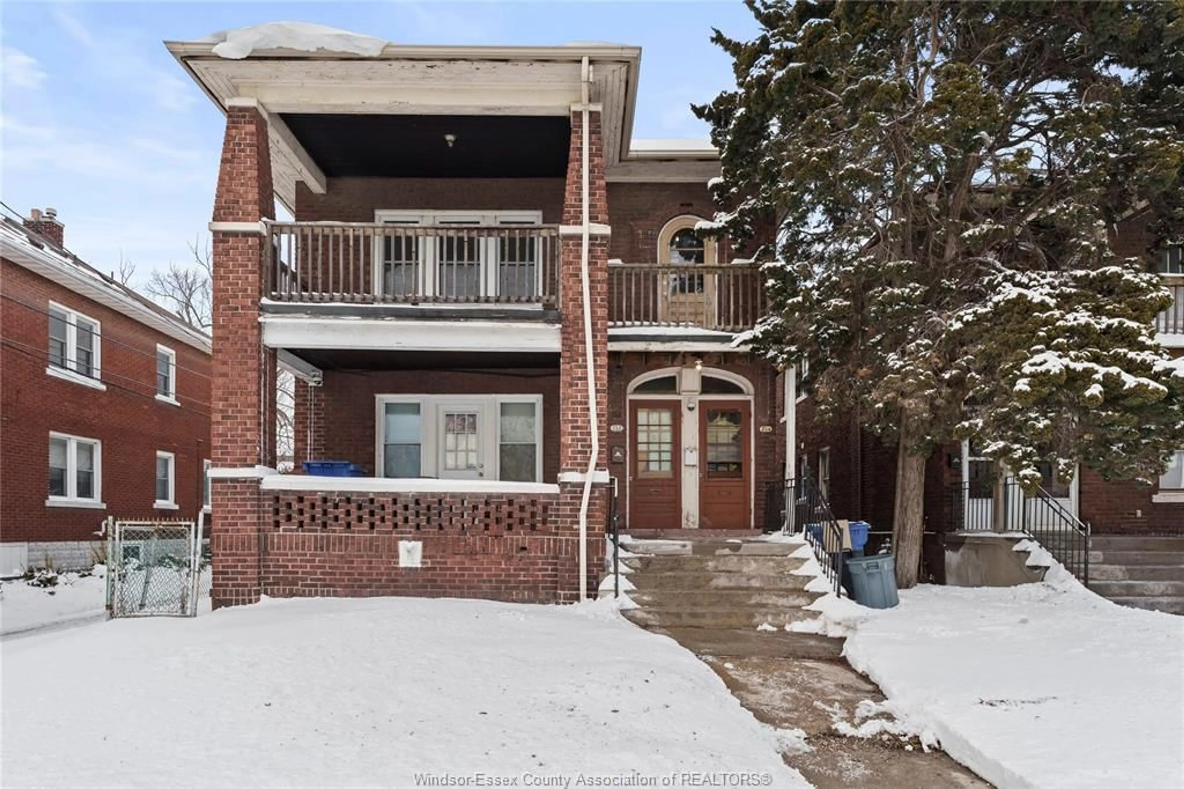 Home with brick exterior material, street for 252-254 GILES Blvd, Windsor Ontario N9A 4C2