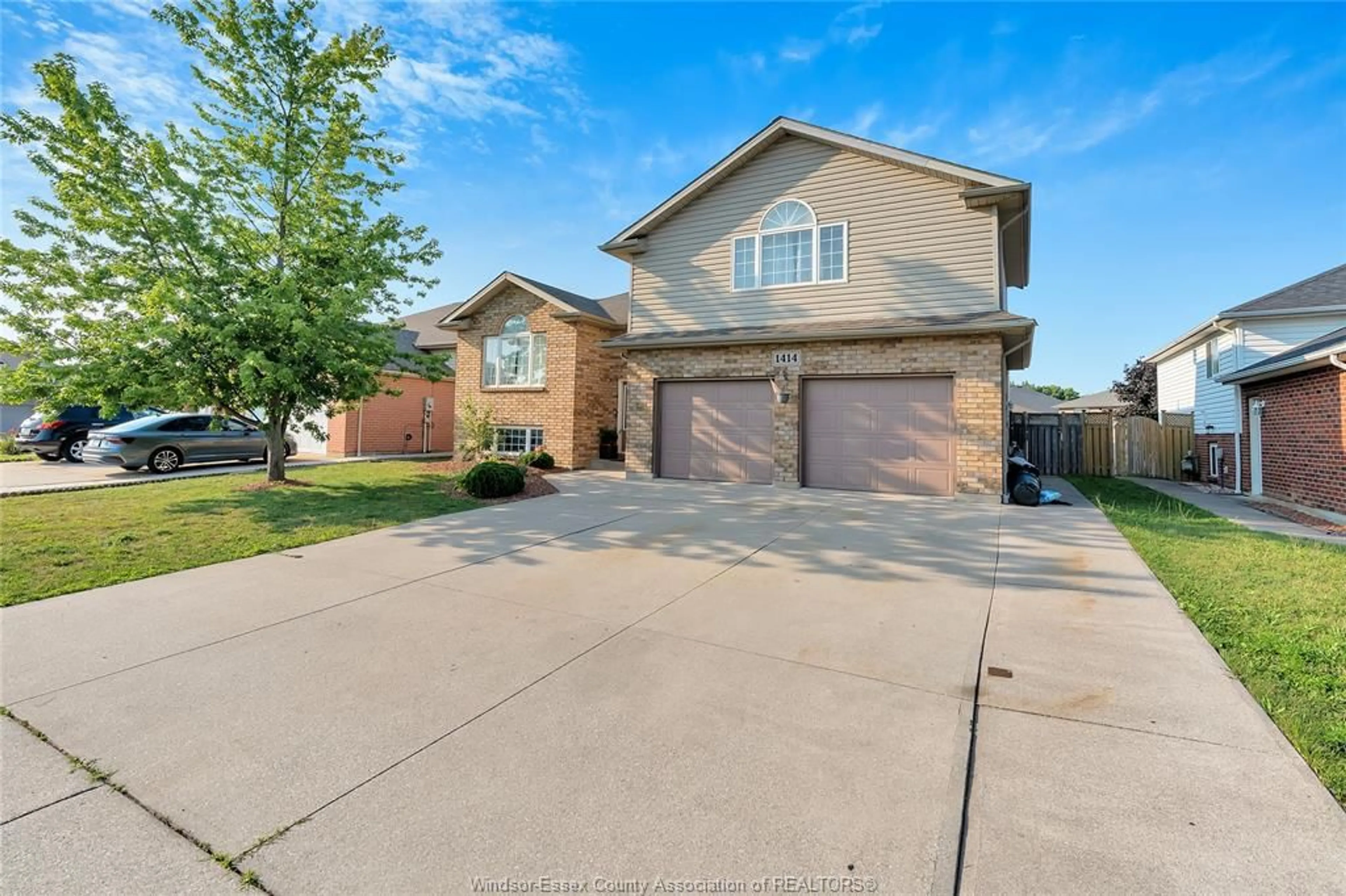 Home with brick exterior material, street for 1414 GIRARD Dr, Lakeshore Ontario N0R 1A0