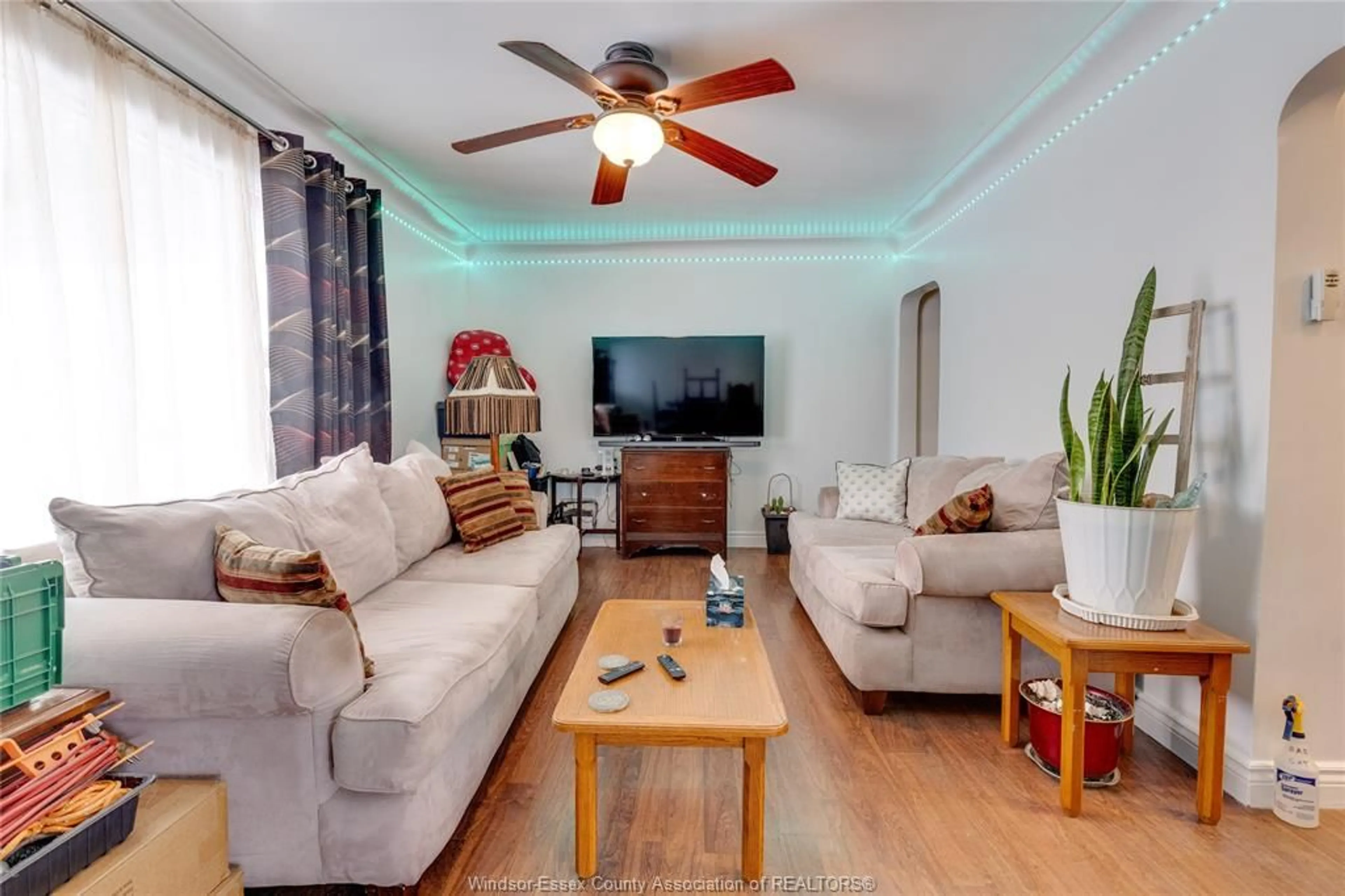 Living room with furniture, wood/laminate floor for 1757 CADILLAC St, Windsor Ontario N8Y 2V7