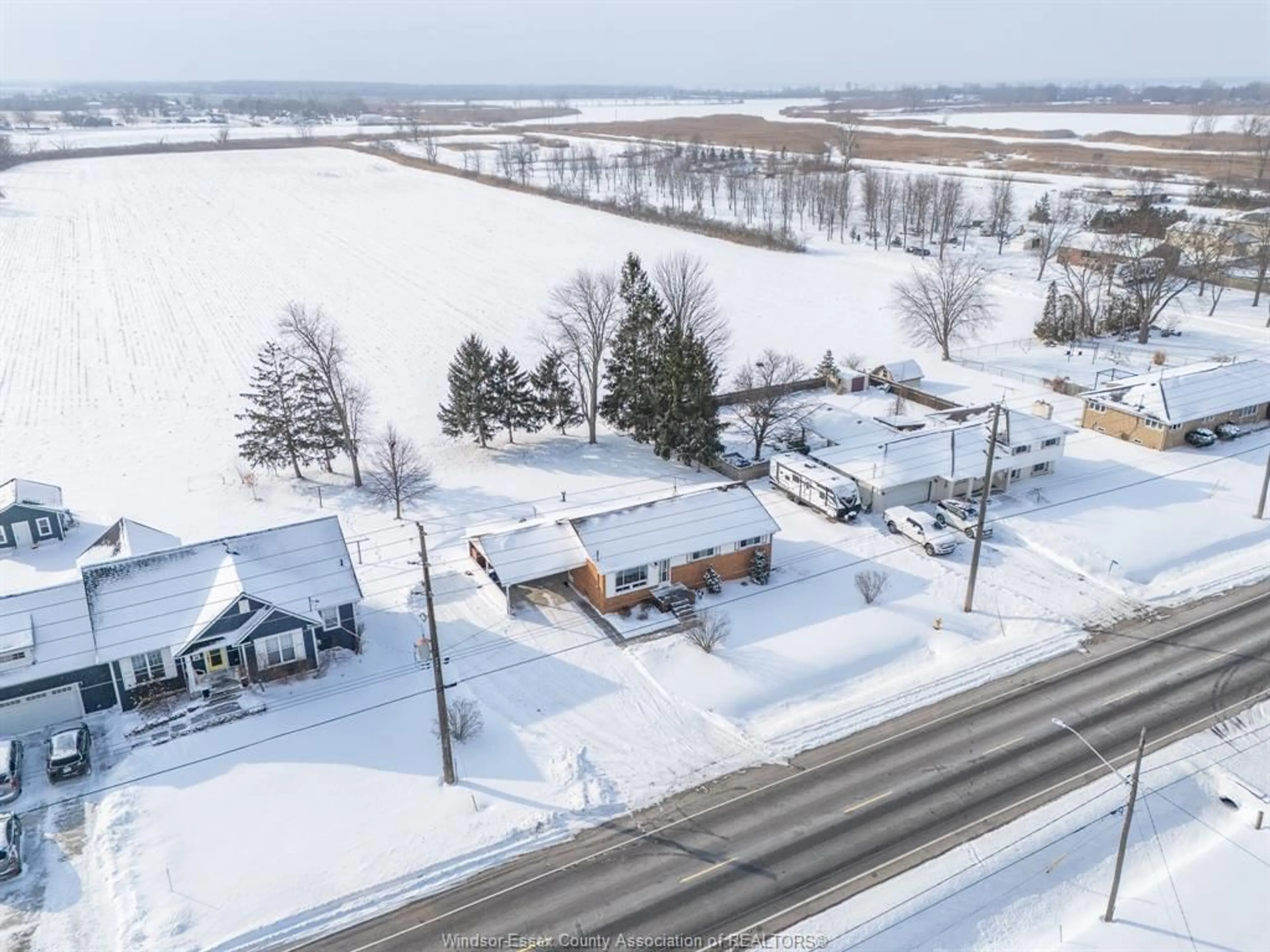 A pic from outside/outdoor area/front of a property/back of a property/a pic from drone, street for 9520 Malden Rd, LaSalle Ontario N9J 2W2