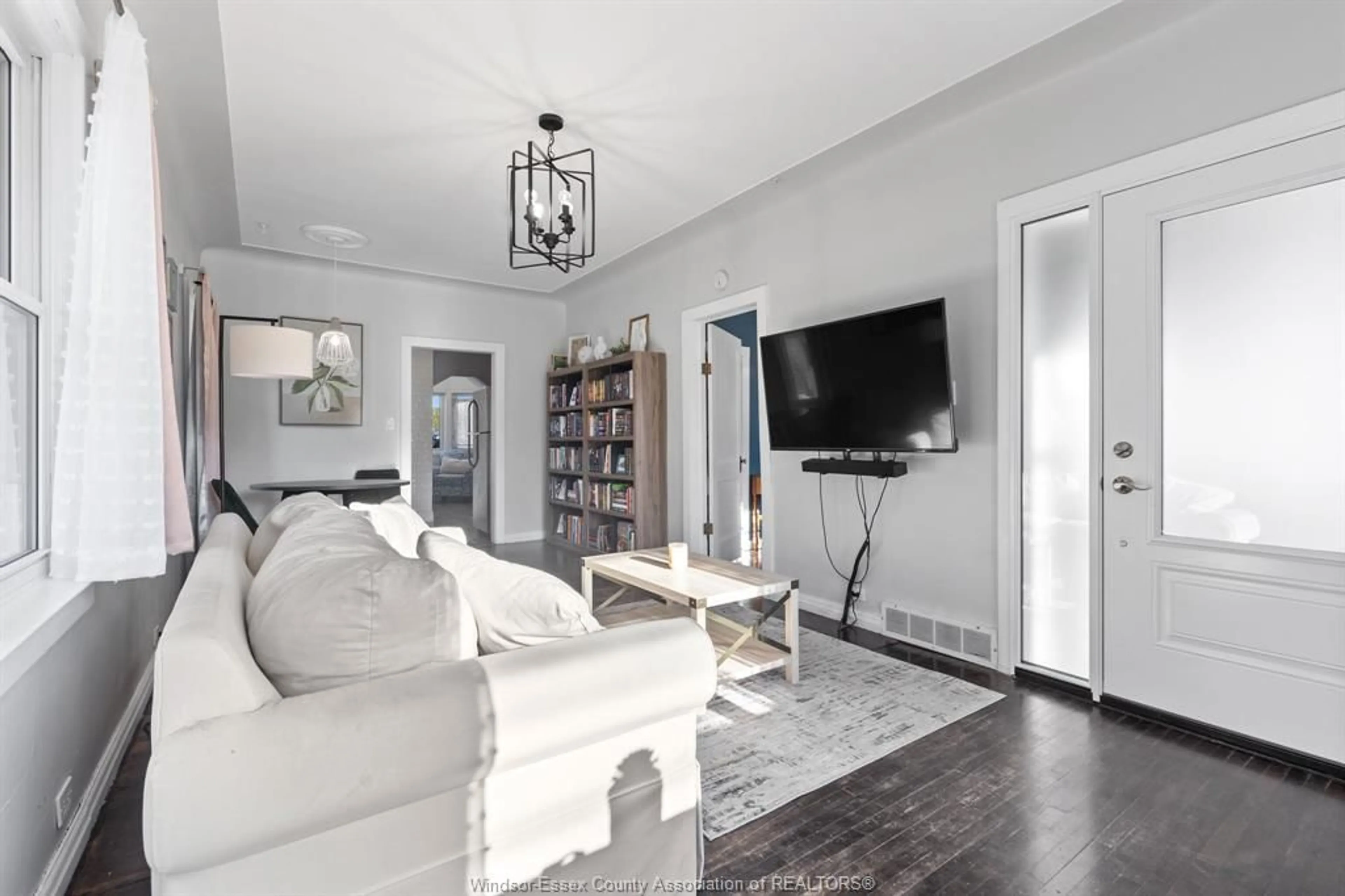 Living room with furniture, wood/laminate floor for 376 LAUZON, Windsor Ontario N8S 3L9