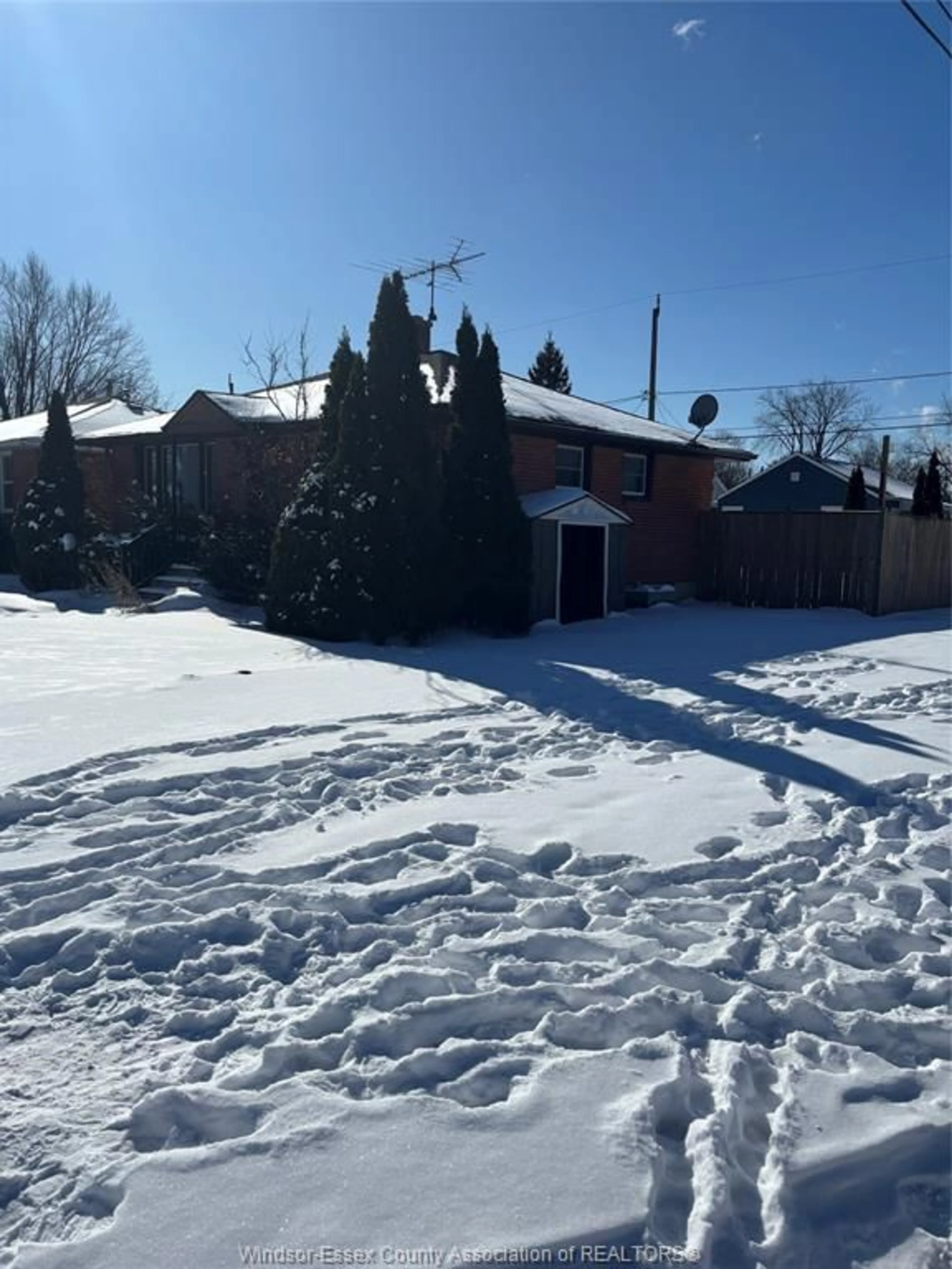 A pic from outside/outdoor area/front of a property/back of a property/a pic from drone, street for 1105 Harrison Ave, Windsor Ontario N9C 3J4