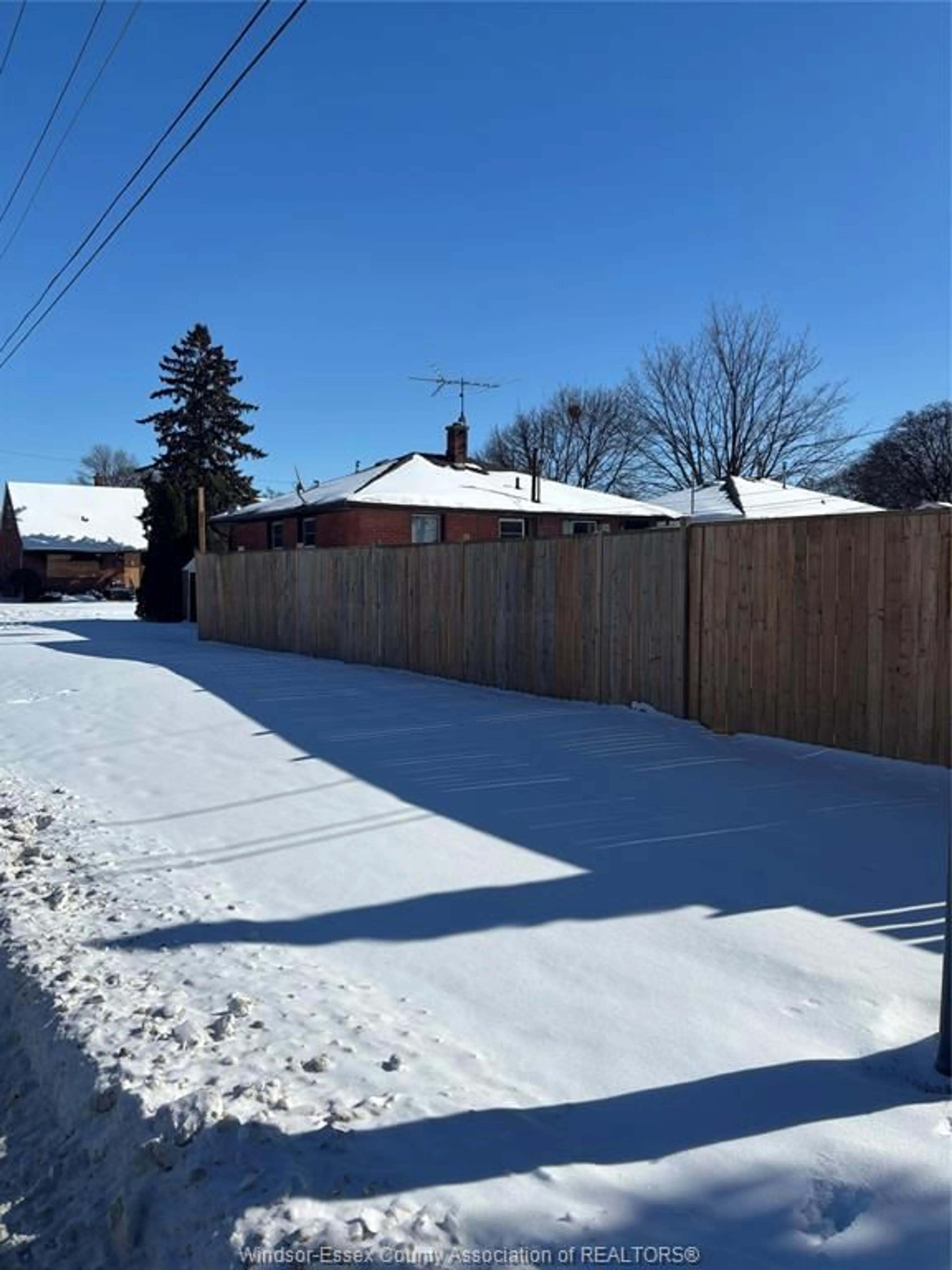 A pic from outside/outdoor area/front of a property/back of a property/a pic from drone, street for 1105 Harrison Ave, Windsor Ontario N9C 3J4