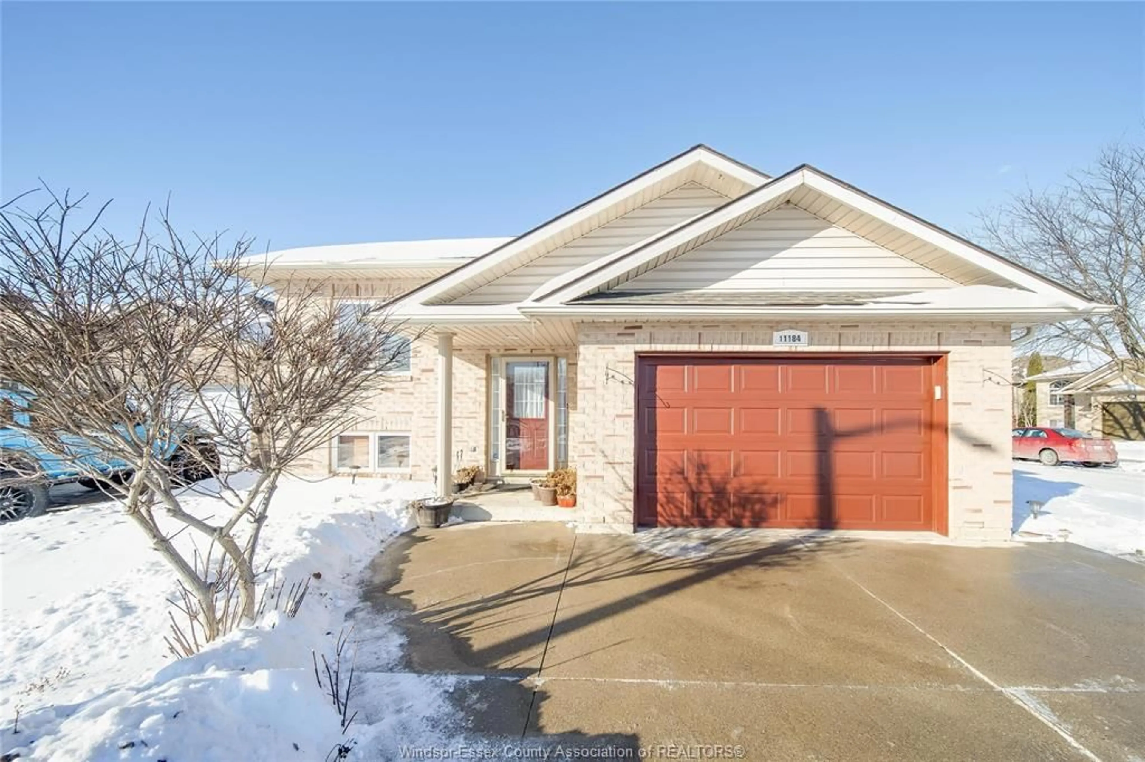 Home with brick exterior material, street for 11184 SPRINGHOLLOW Dr, Windsor Ontario N9P 1N3