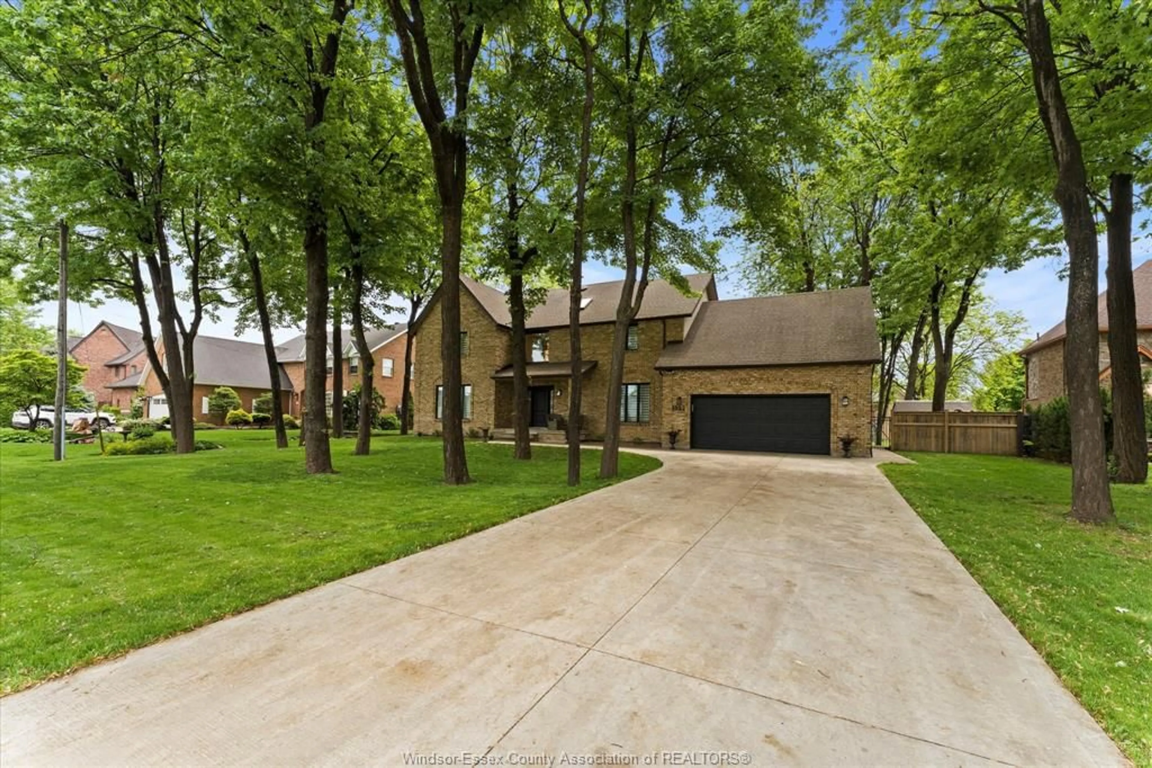 Home with brick exterior material, street for 359 ELMGROVE Dr, Lakeshore Ontario N8N 4H1