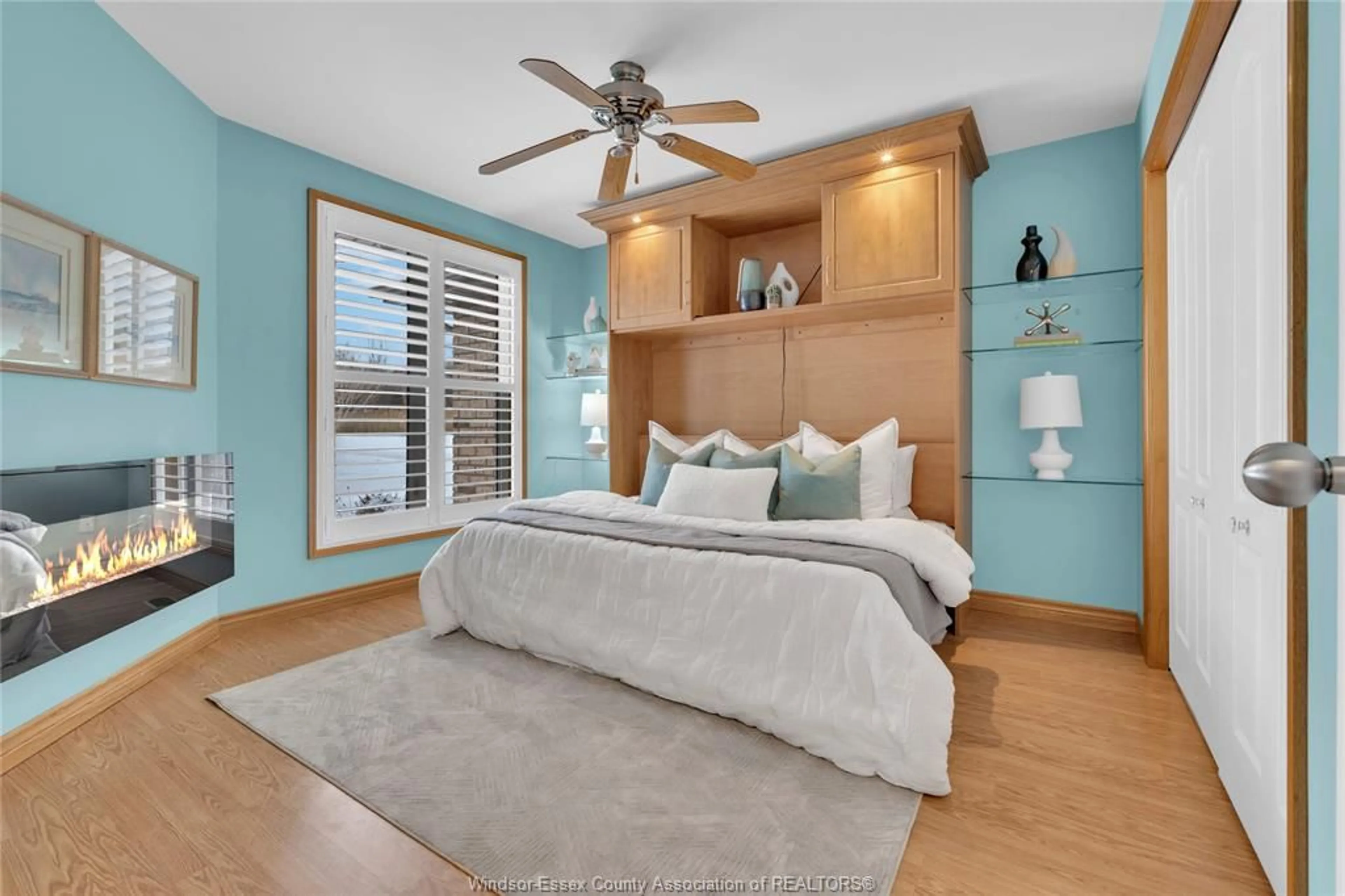 Bedroom with bed, wood/laminate floor for 11806 Cobblestone Cresent, Windsor Ontario N8P 1P3