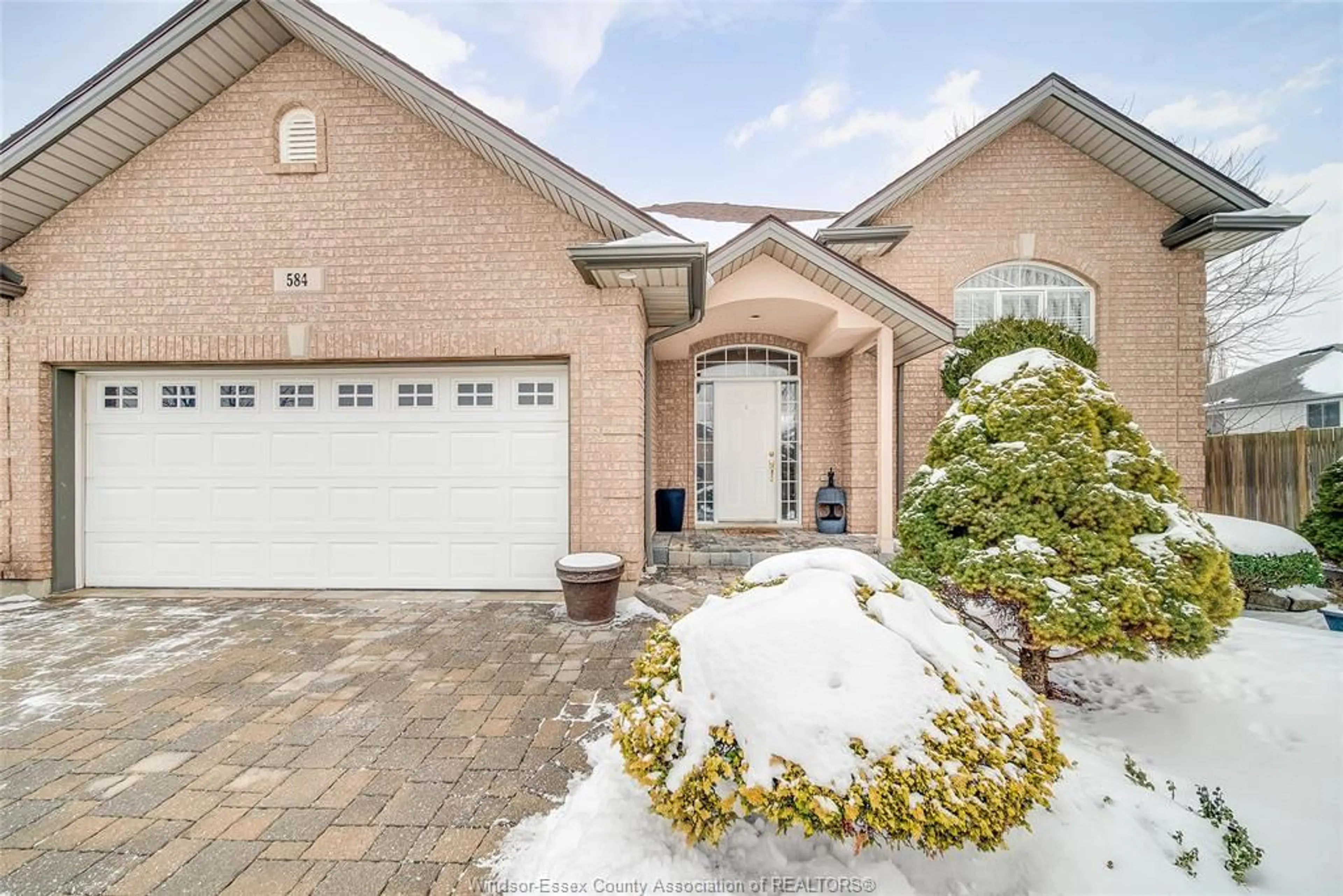Home with brick exterior material, street for 584 BELLAGIO Dr, Windsor Ontario N8P 1J9