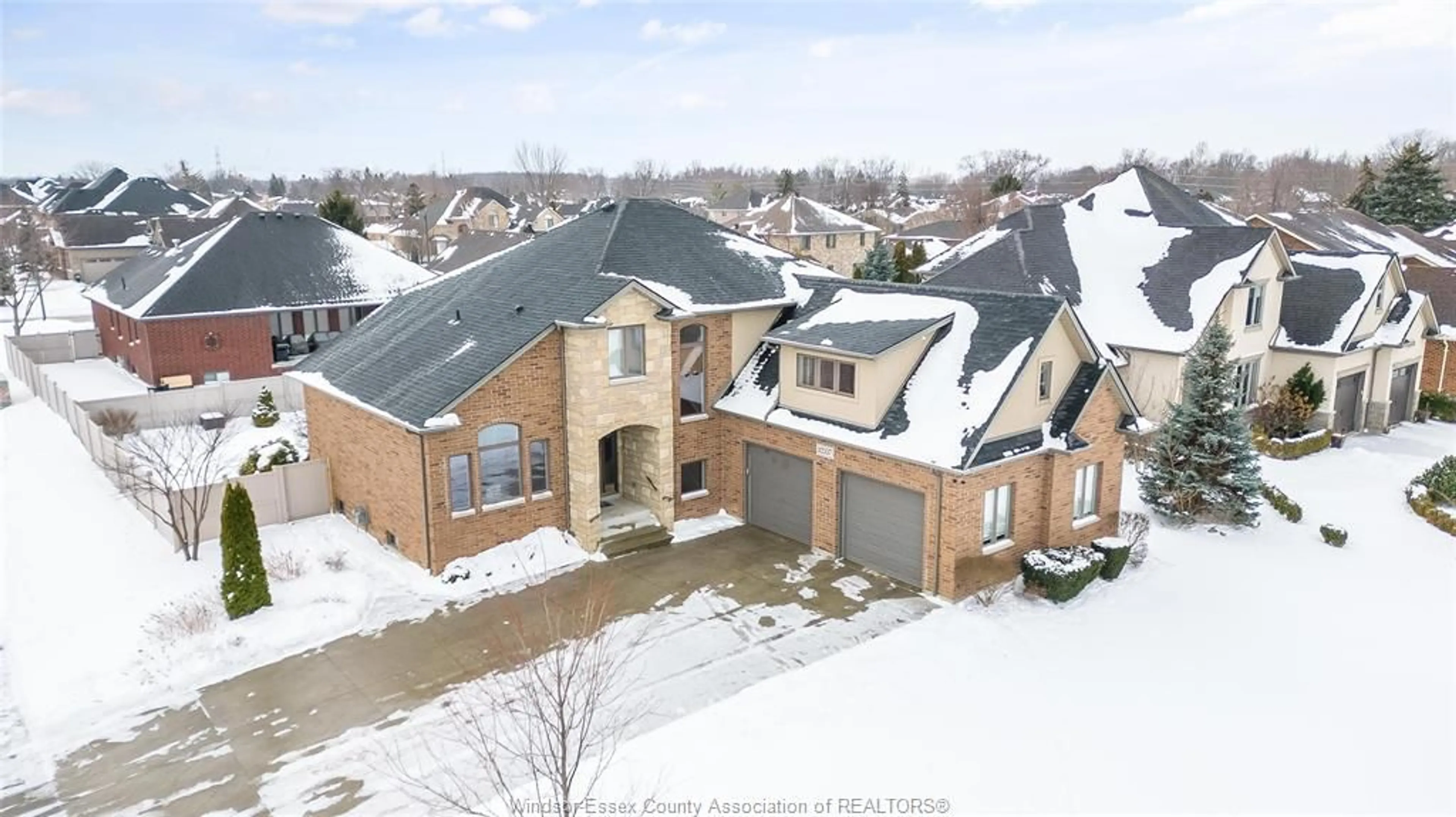 A pic from outside/outdoor area/front of a property/back of a property/a pic from drone, street for 12337 CANDLEWOOD Dr, Tecumseh Ontario N9K 0A3