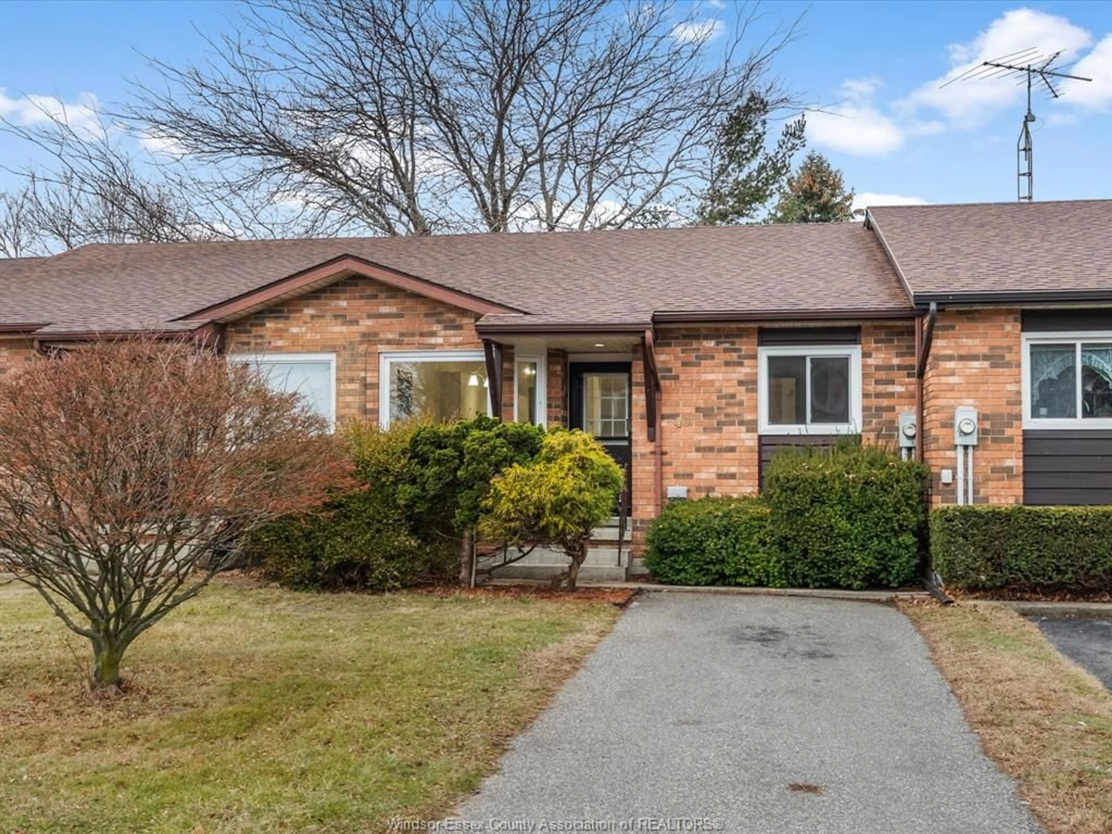 Home with brick exterior material, street for 40 Remark Dr, Kingsville Ontario N9Y 3X6