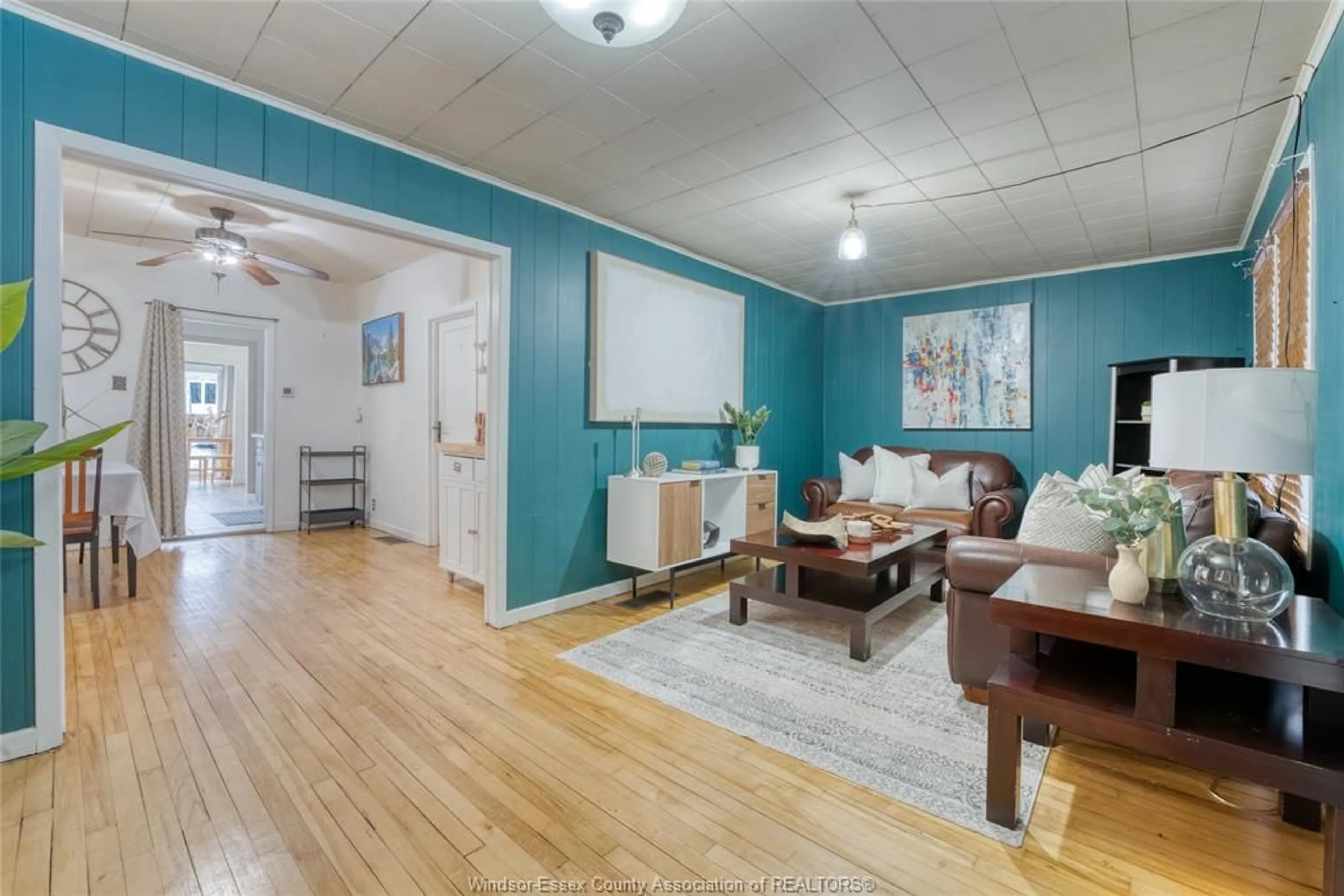 Living room with furniture, wood/laminate floor for 1581 CADILLAC St, Windsor Ontario N8Y 2C4