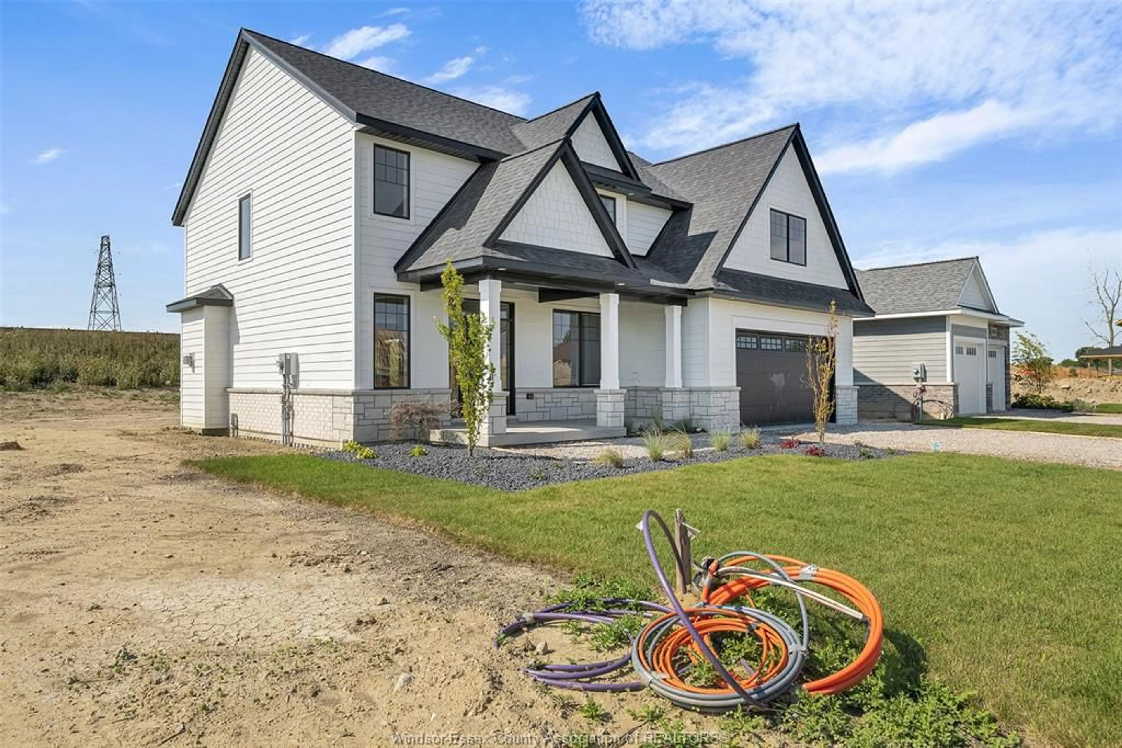 Home with vinyl exterior material, street for 261 CHARLES St, Essex Ontario N8M 0C5