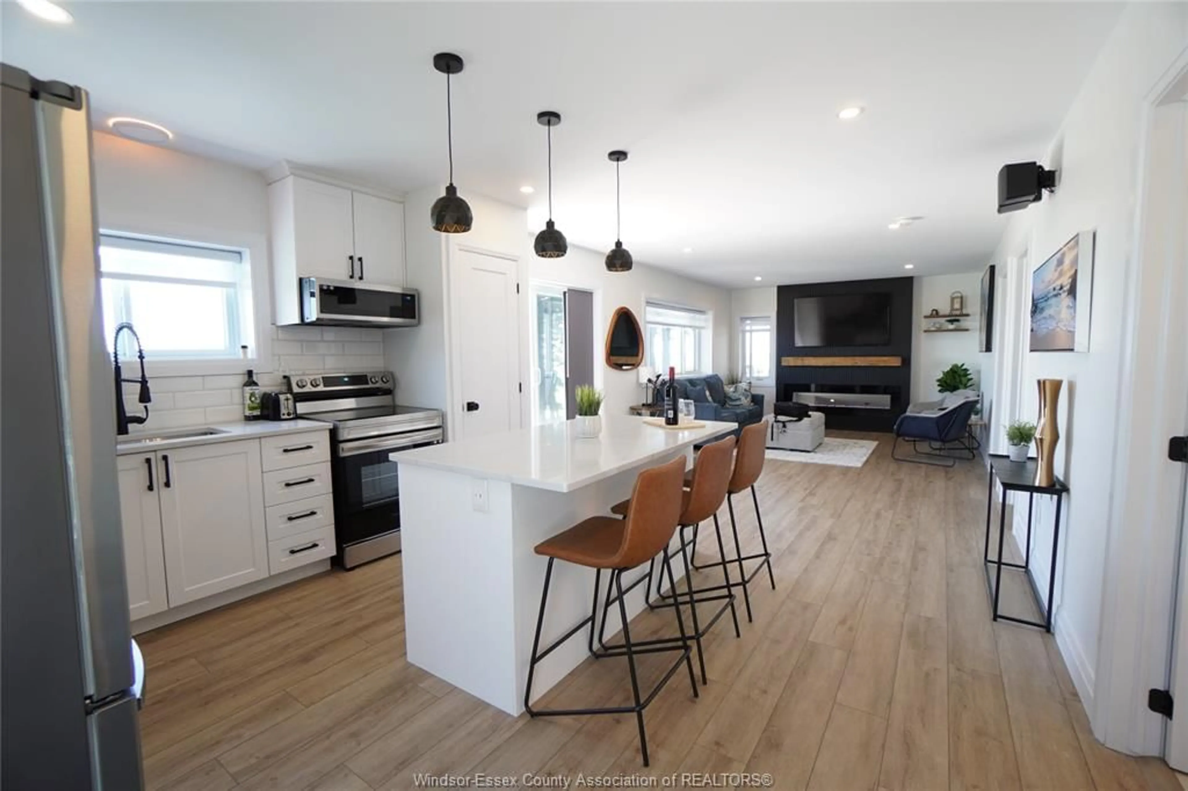 Open concept kitchen, wood/laminate floor for 19 LEVERGOOD Lane, Amherstburg Ontario N0R 1G0