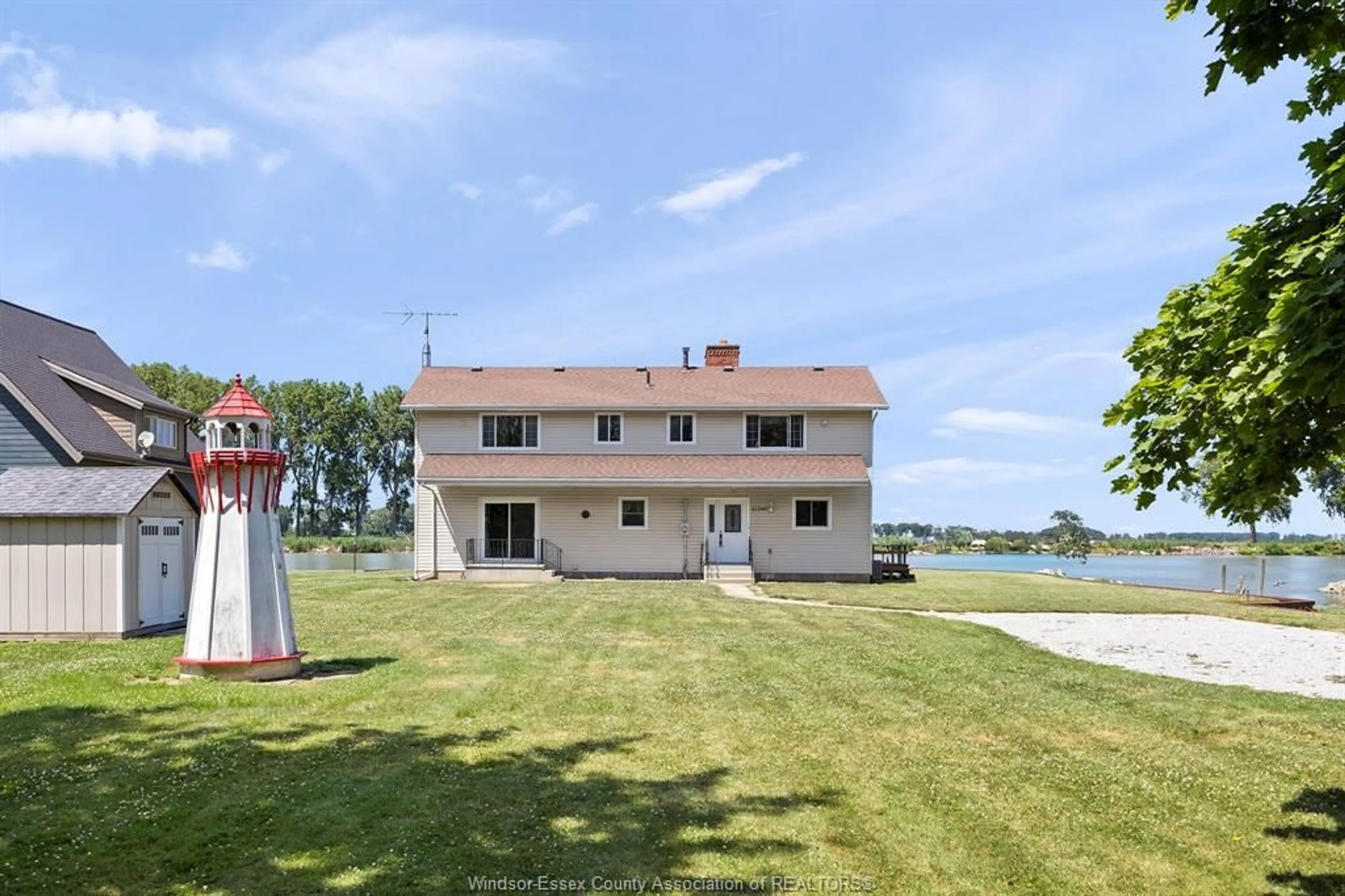 A pic from outside/outdoor area/front of a property/back of a property/a pic from drone, water/lake/river/ocean view for 21240 DOCKSIDE Rd, Tilbury North Ontario N0P 1L0