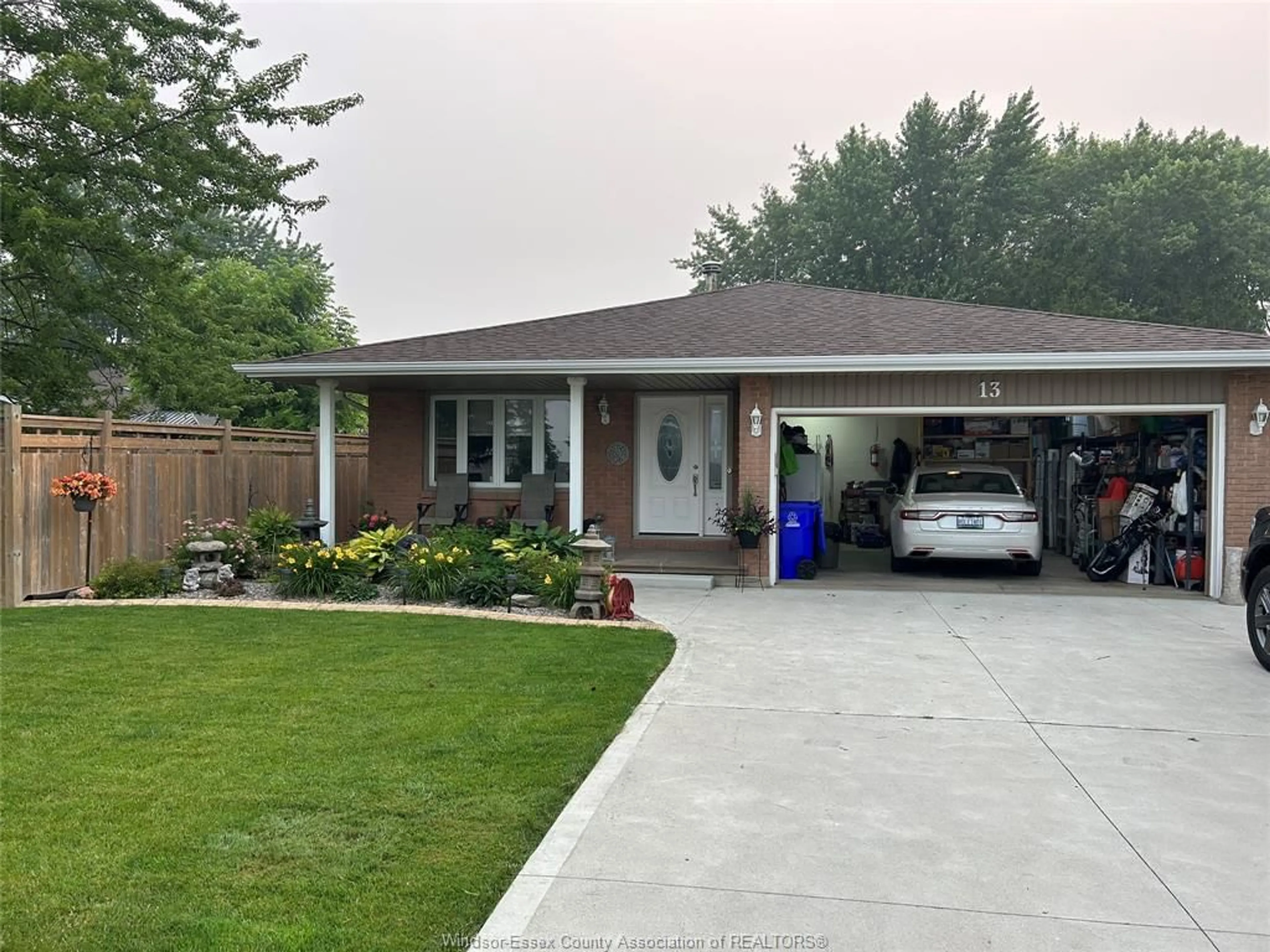 A pic from outside/outdoor area/front of a property/back of a property/a pic from drone, street for 13 SOUTH TALBOT Rd, Essex Ontario N8M 1L8