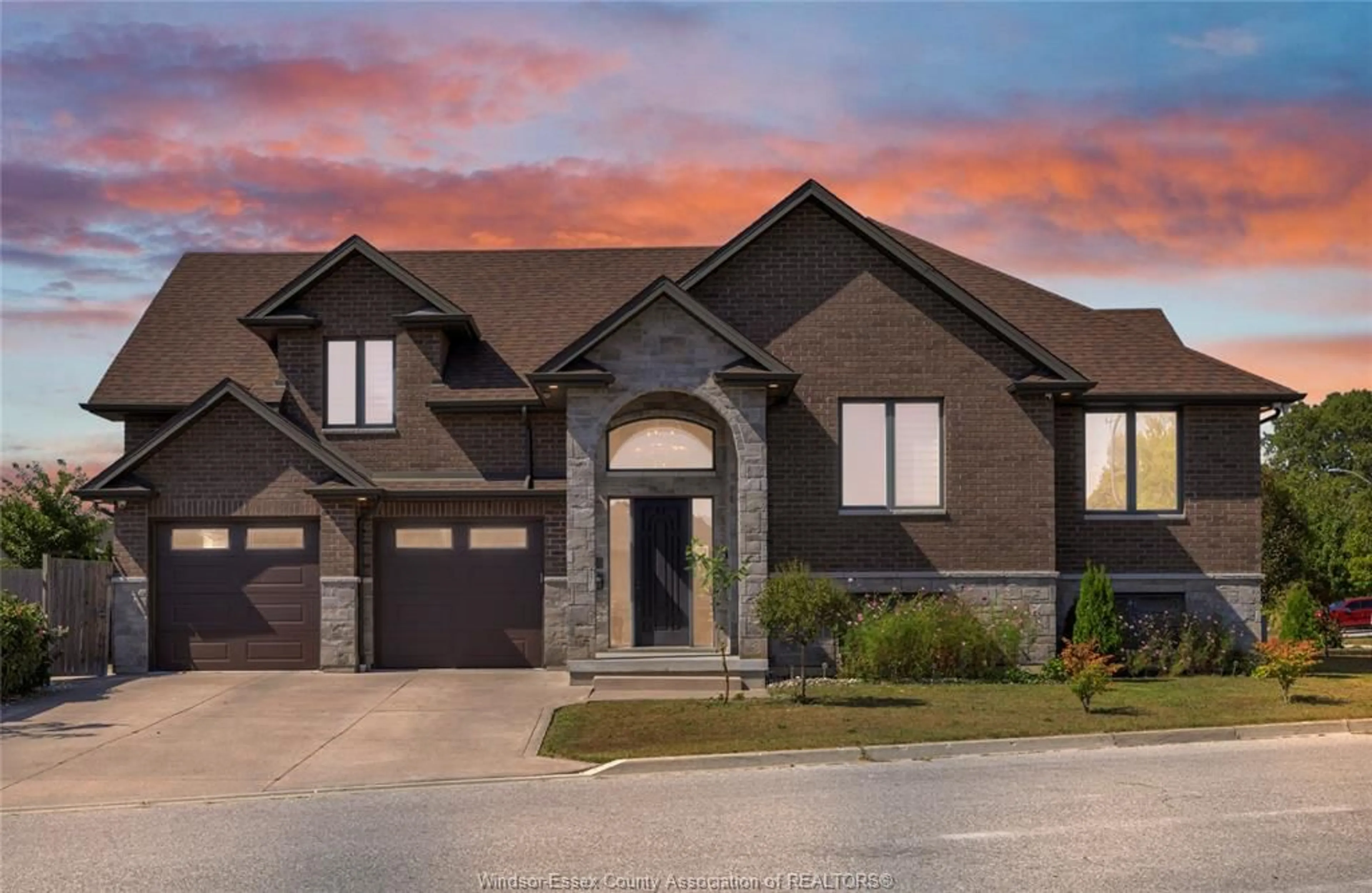 Home with brick exterior material, street for 498 SACRED HEART Dr, LaSalle Ontario N9J 0A6