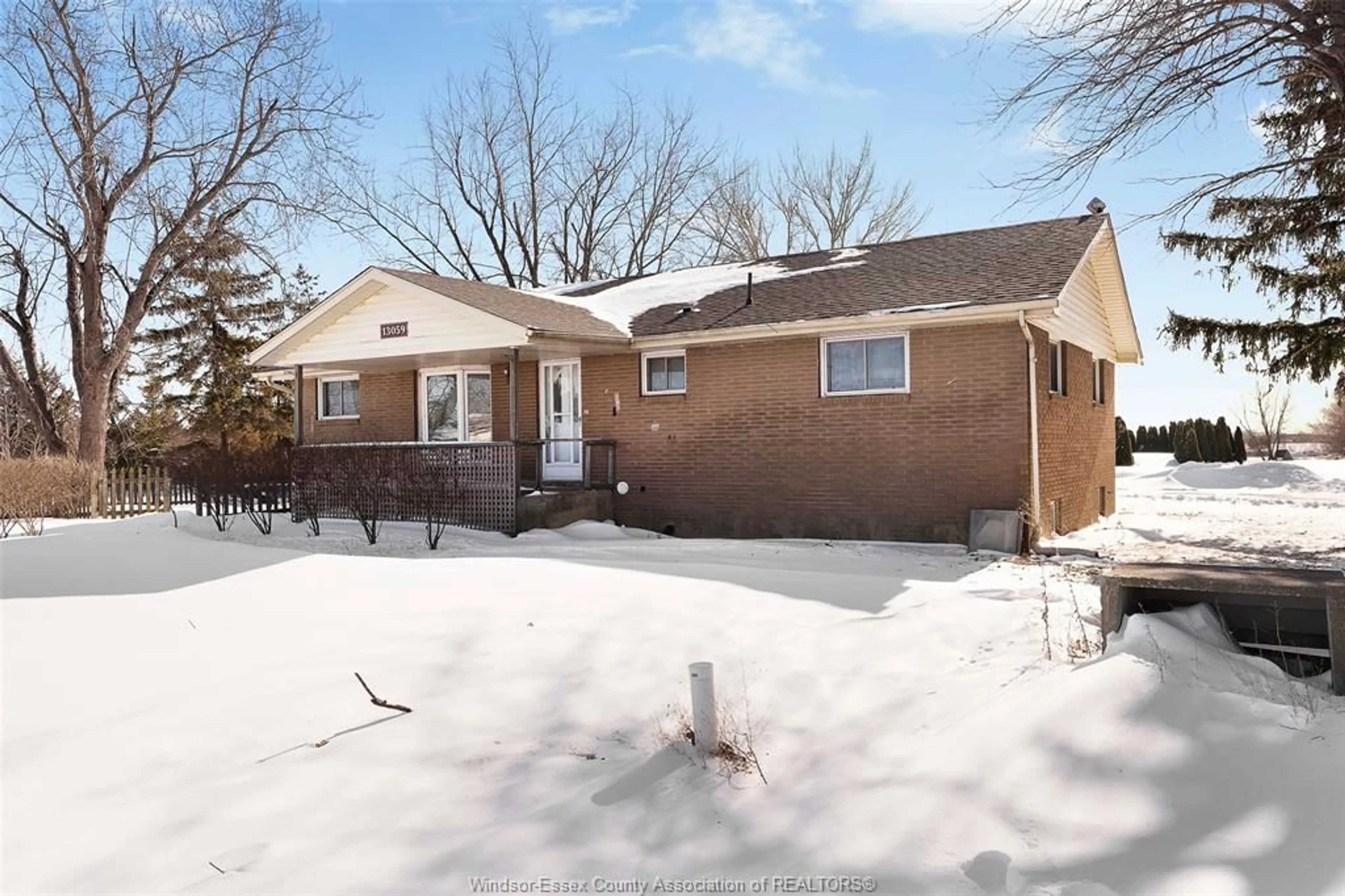 Home with brick exterior material, street for 13059 CONCESSION 13, Essex Ontario N0R 1J0